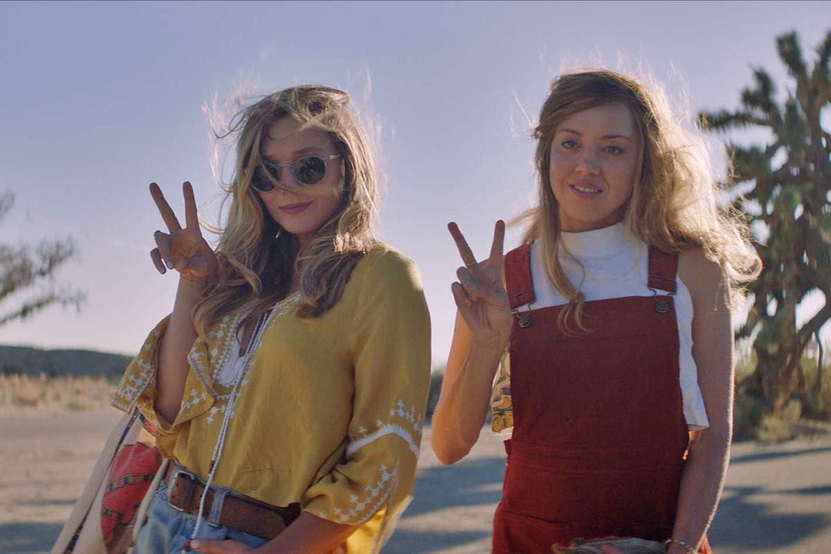 There are so many reasons to watch #ingridgoeswest 2 of which are in this photo!!! Listen to us talk about the film in this weeks episode of Heavenly Features out now wherever you get your podcasts. 

ID 2 white blond women stand in the desert doing 