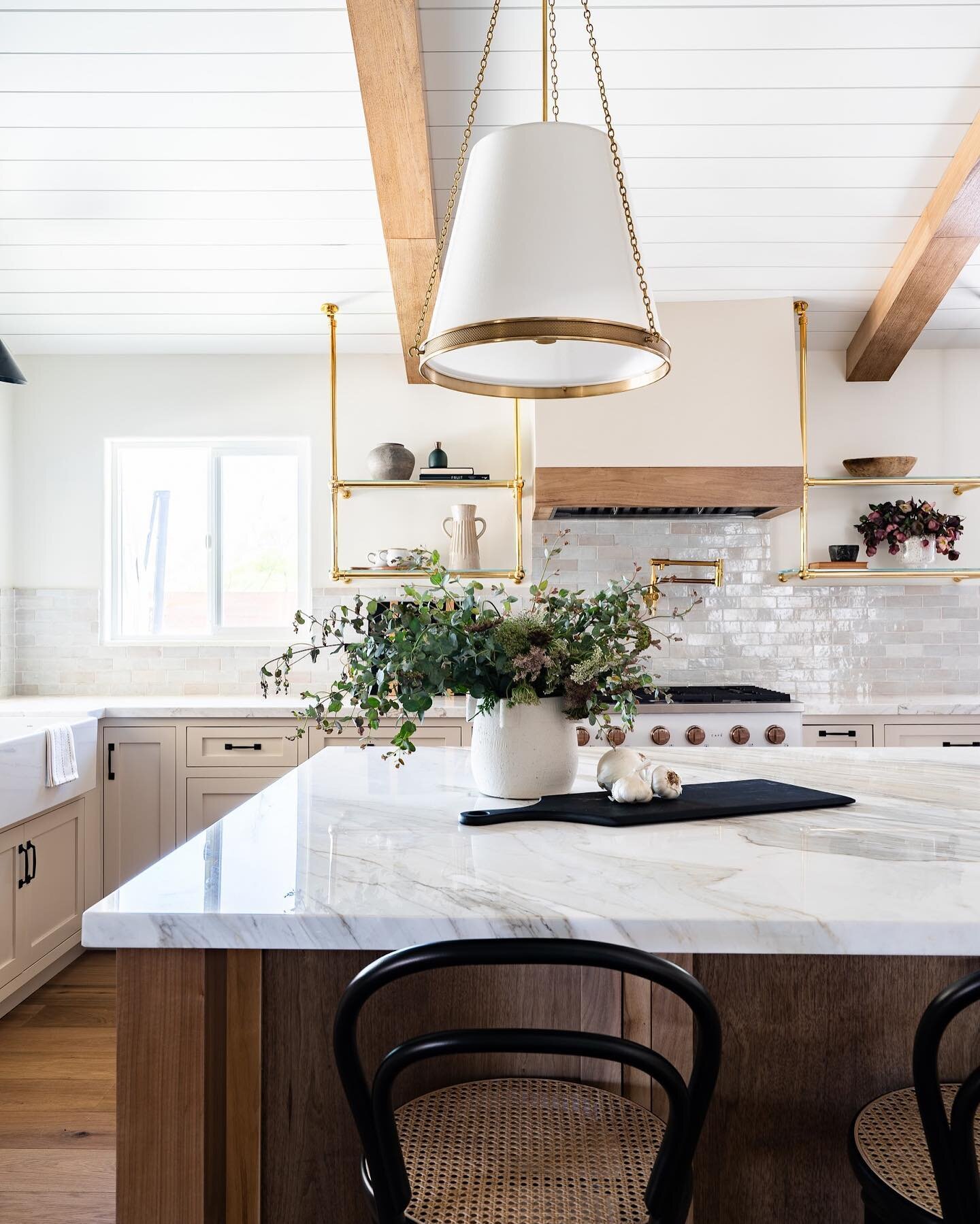 This warm &amp; airy Kitchen Remodel went to a whole new level with transformative vaulted ceilings. Claiming the unseen space in the ceiling that was home to HVAC and electrical was a must for our single story rambler. We just love the overall  feel