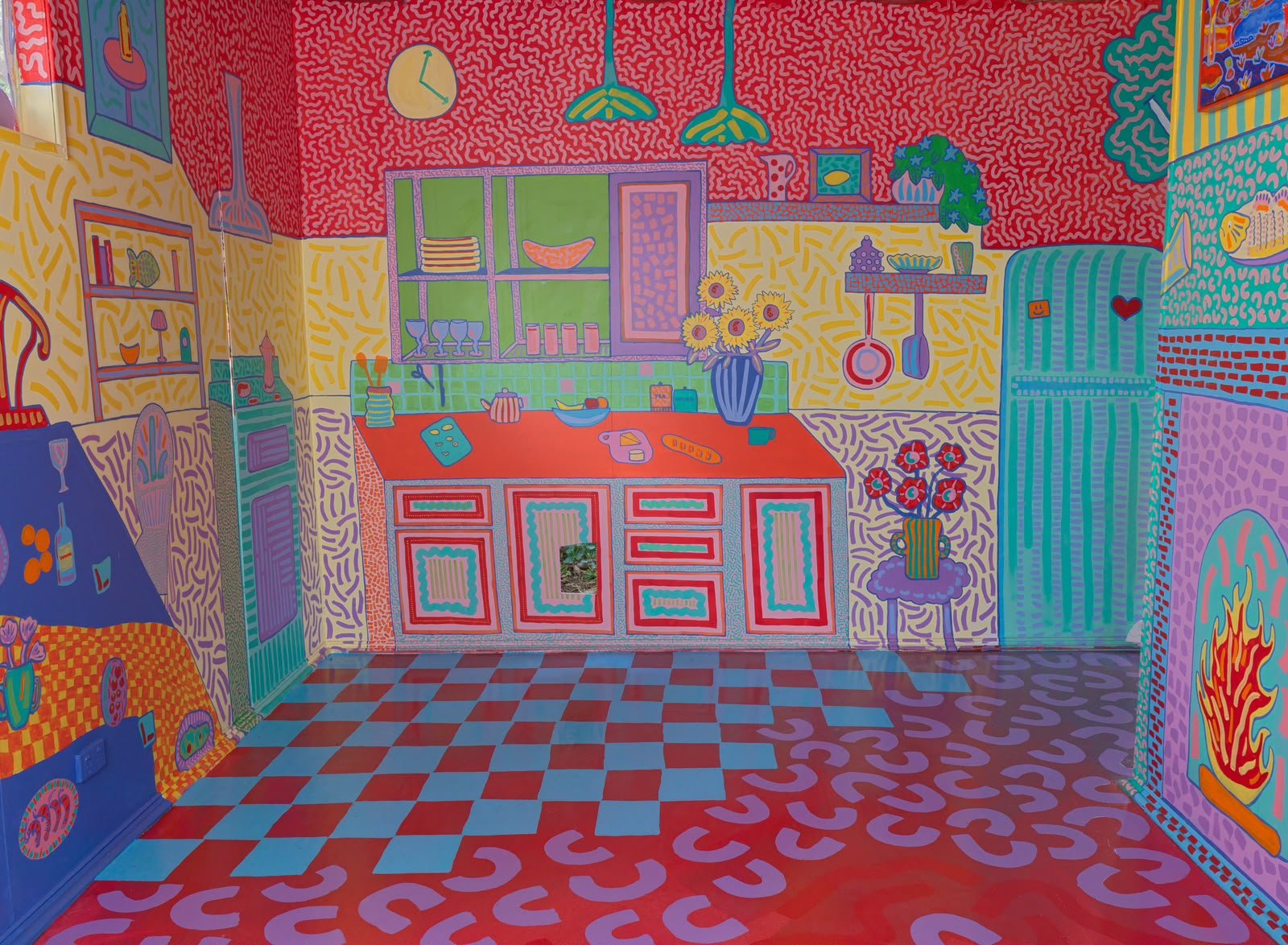 Brightly coloured mural depicting a playful domestic interior with illustrated furniture, windows and everyday objects, part of the Side Quest Stories project.
