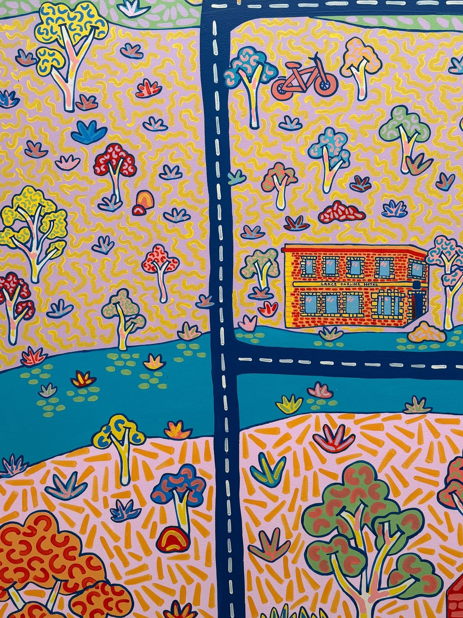 Detail of Kat Tillman’s Collingwood mural featuring the Grace Darling Hotel surrounded by colourful trees and native plants.