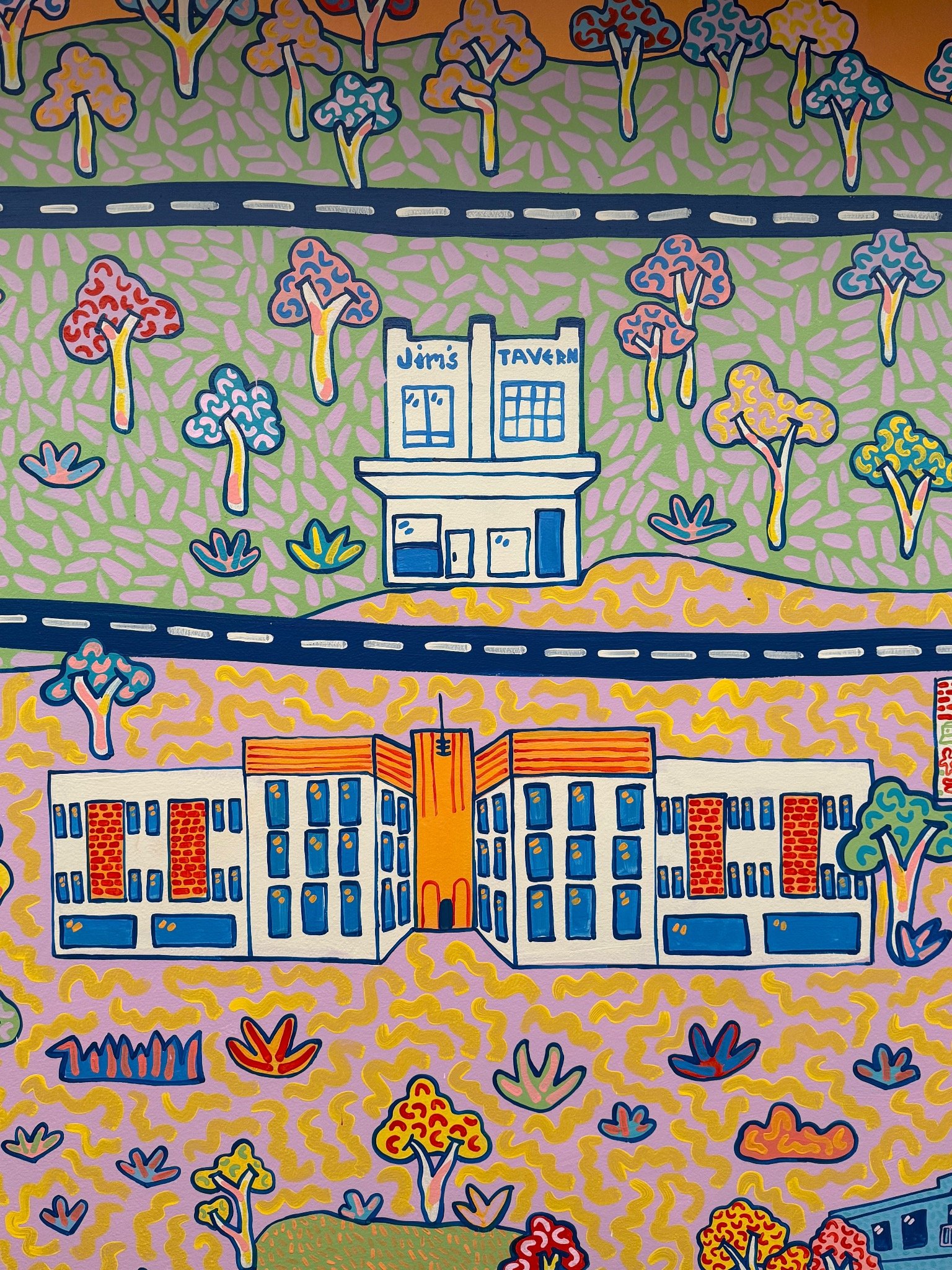 Detail of Kat Tillman’s Collingwood map mural featuring Jim’s Tavern and surrounding local architecture and landscape.