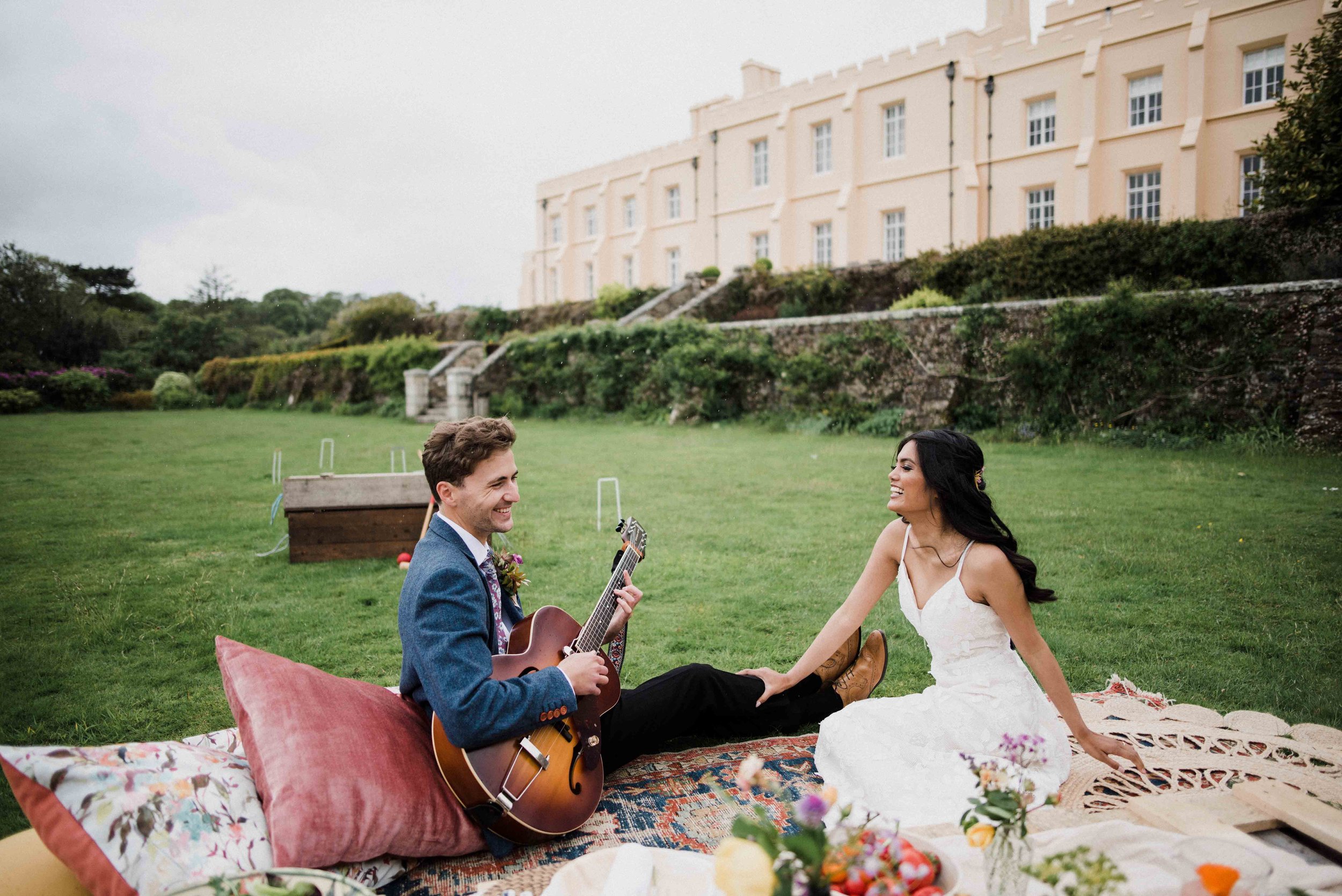 A small, outdoor wedding reception with a picnic and lawn games at Pentillie Castle in Cornwall.jpg