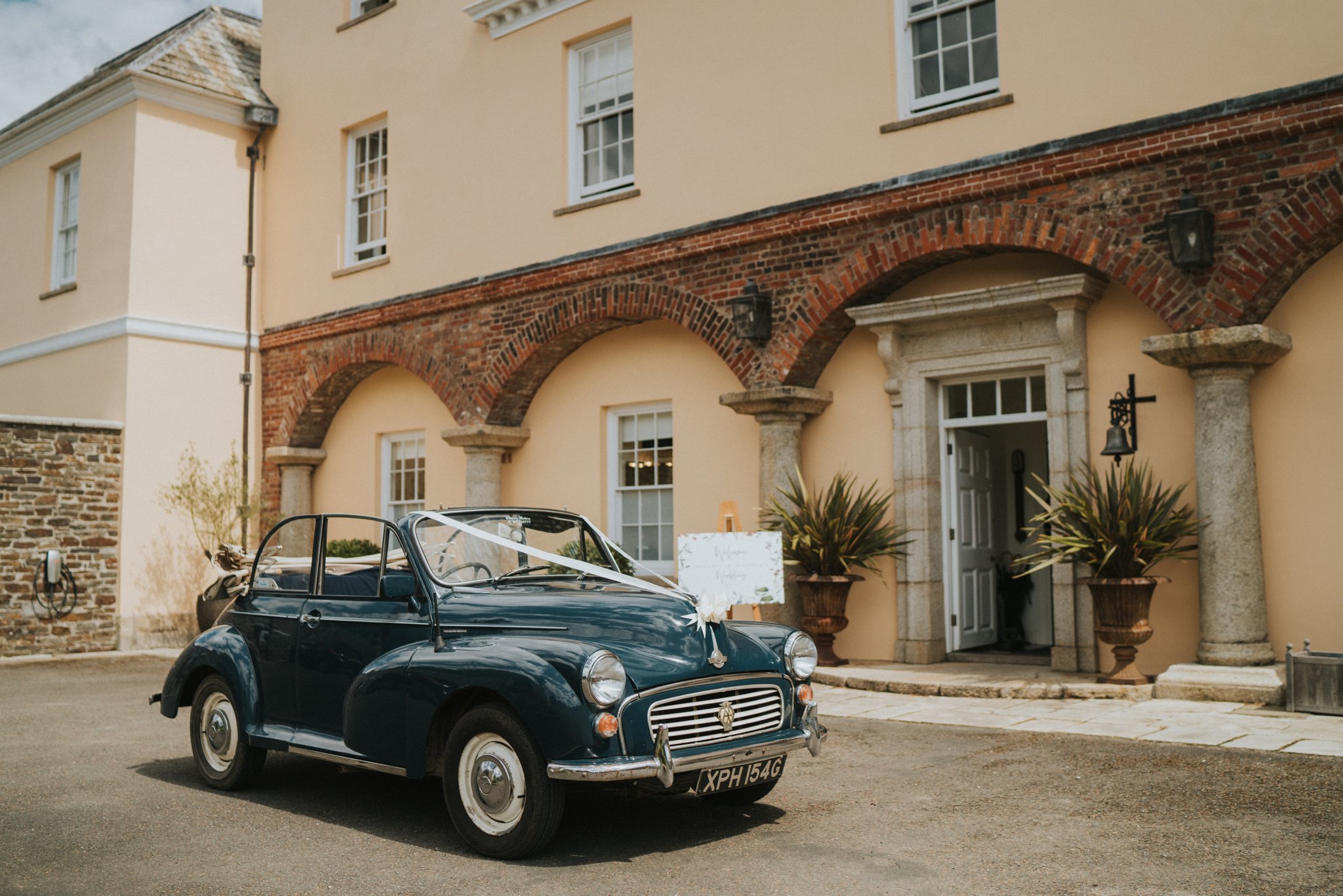 9 A vintage wedding car at the luxurious Pentillie Castle - Photography by Grace.jpg