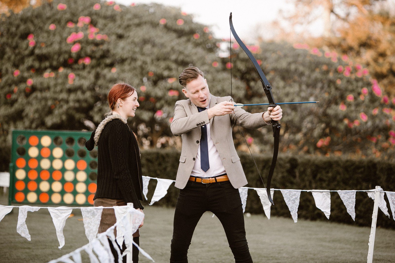 Wedding reception lawn games and archery at Pentillie Castle in Cornwall, by UpArt Photography.jpg