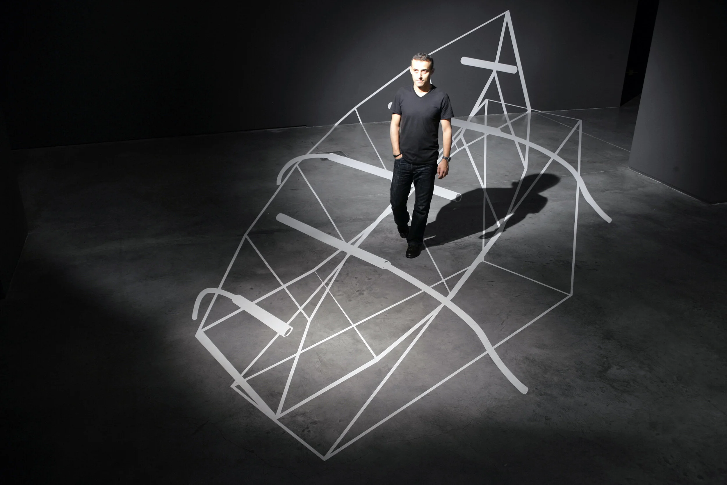 Silent Systems (2011). Vinyl, HD camera, wall bracket, 46” HD monitor floor section: 900 x 400 cm, wall section: 400 x 130 cm. Installation view, Alterity, Rampa Istanbul, 2011.
© Levent Yalinay