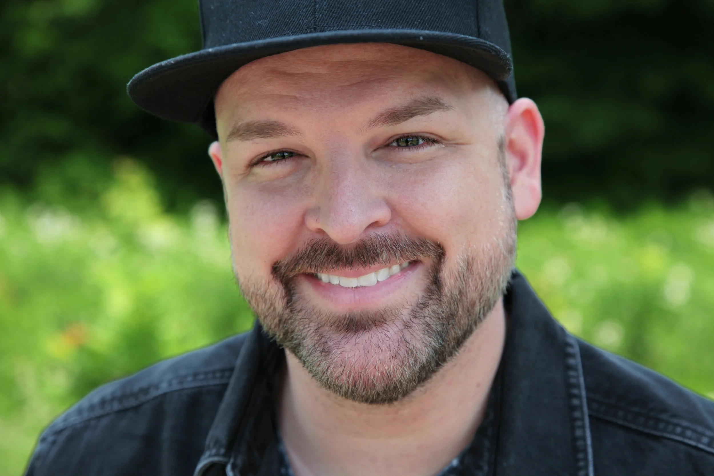 Brian Simonson - Black hat headshot.jpeg