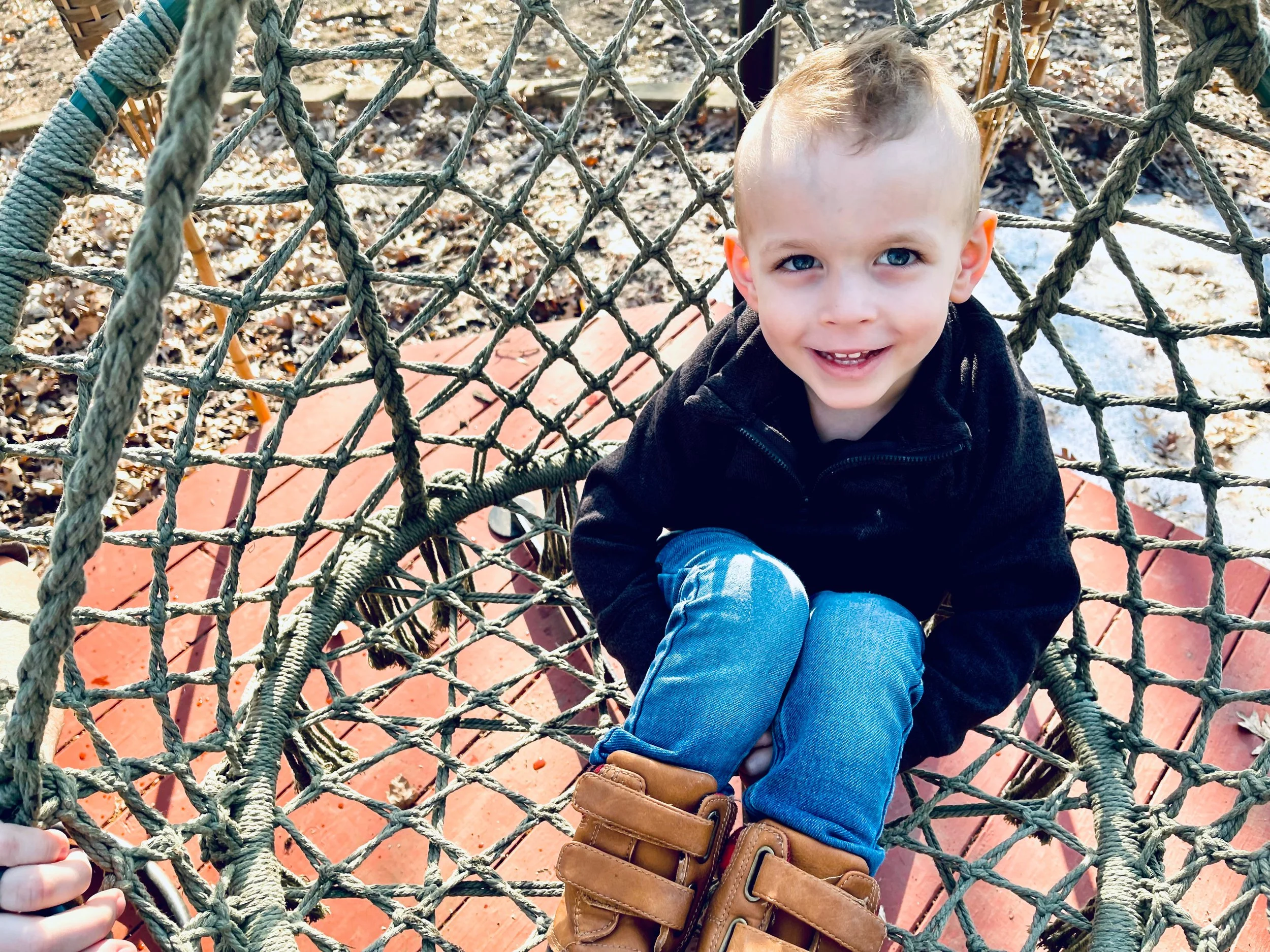 Knox 4 years old on swing.jpeg