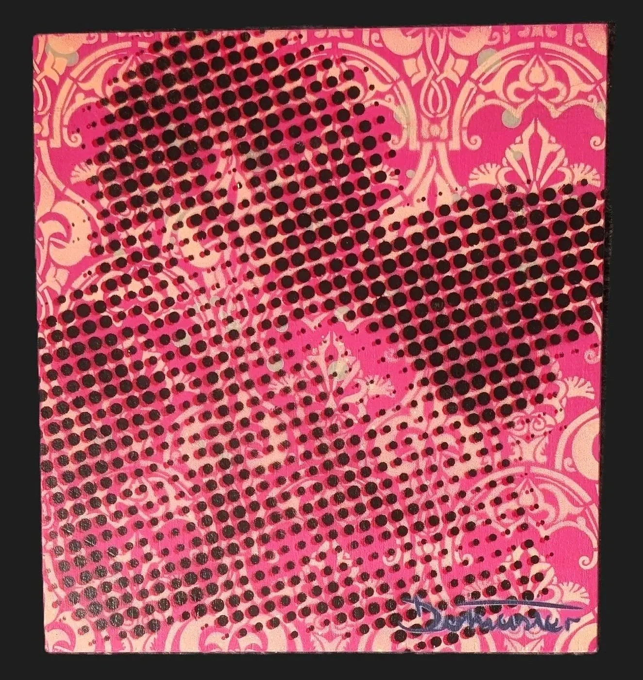 A winged Putti resting their chin on their hands pink colourway hand signed The Dotmaster its only paper