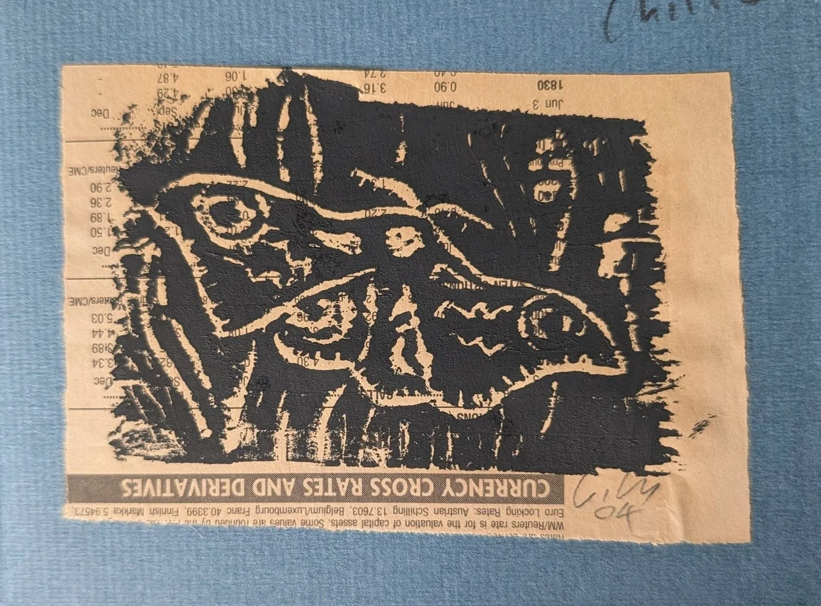 Detail of woodcut on pink paper.jpg