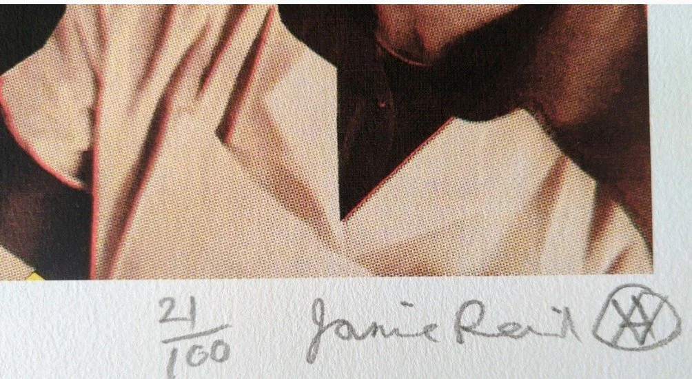 Detail of Jamie Reid's hand-written signature in pencil, artist symbol, and edition number 21/100