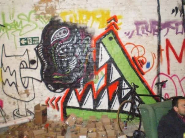 pure evil piece and boxes of spray paints banksy cans festival