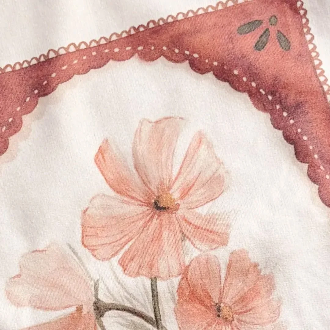 Close-up of watercolor pink cosmos on the sand crewneck sweatshirt