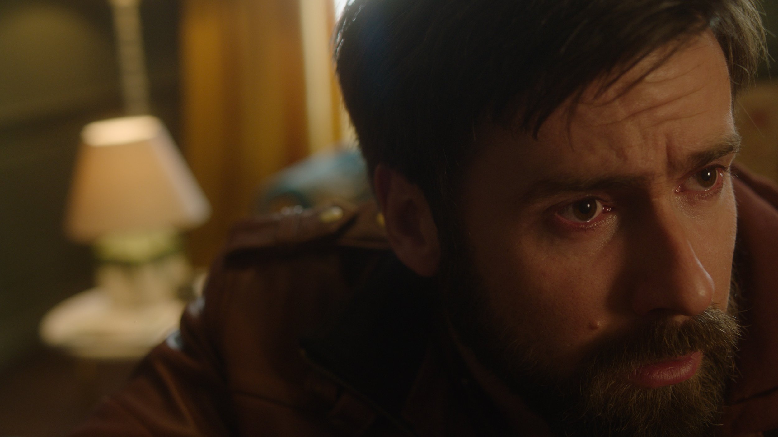 Mark Rowley as Rhys