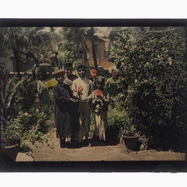 &quot;Little Peon in Compound, Great Western Hotel, Bombay&quot;. Photograph by Helen Messinger Murdoch, circa 1914. This photo was shot in the Autochrome process, a color process invented by the Lumiere Brothers. Helen Messinger Murdoch has the dist