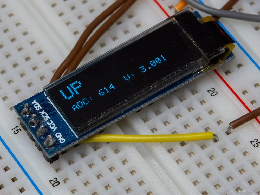 A test result printed on the OLED display