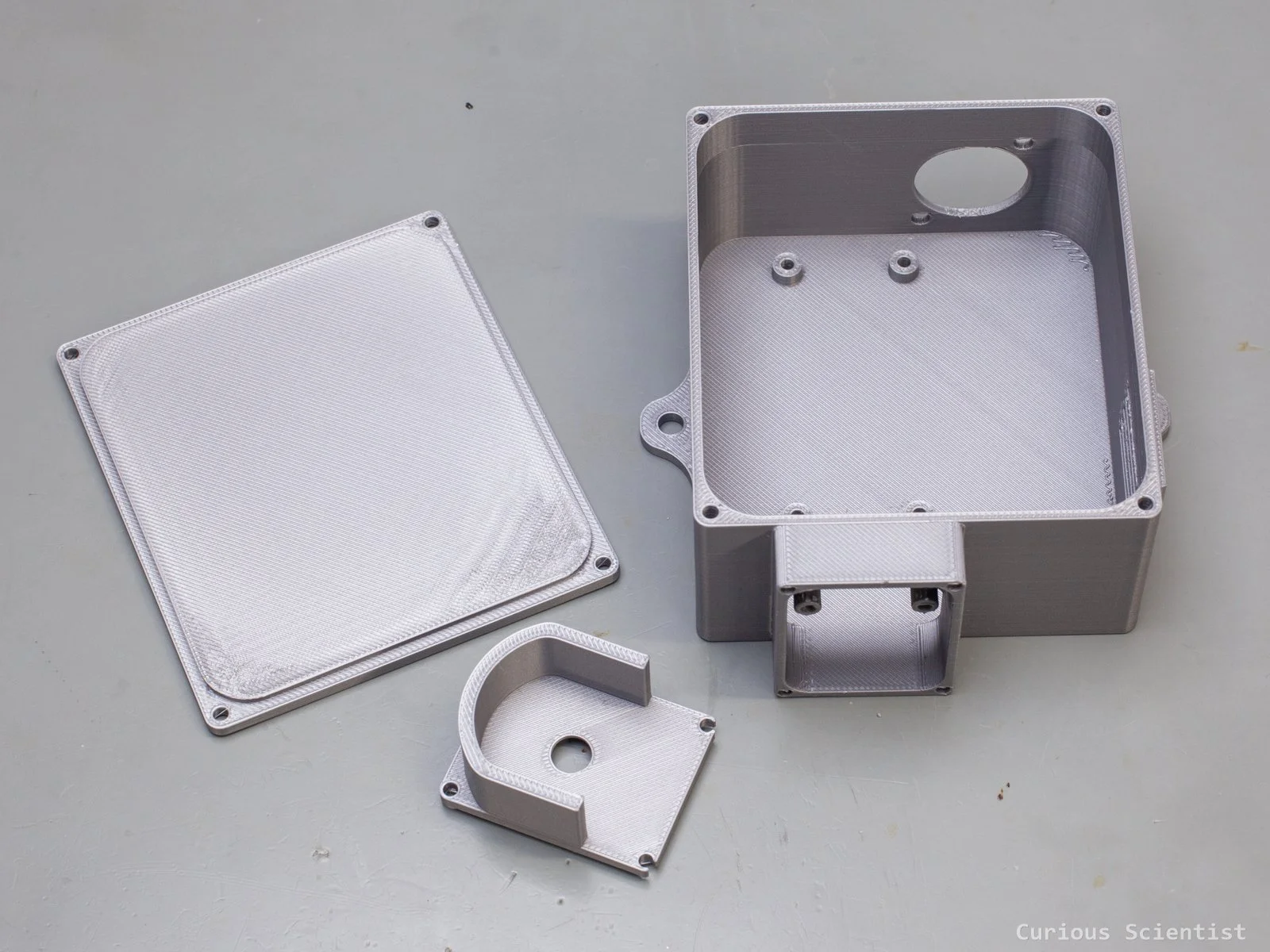 Lid, camera shield and main enclosure