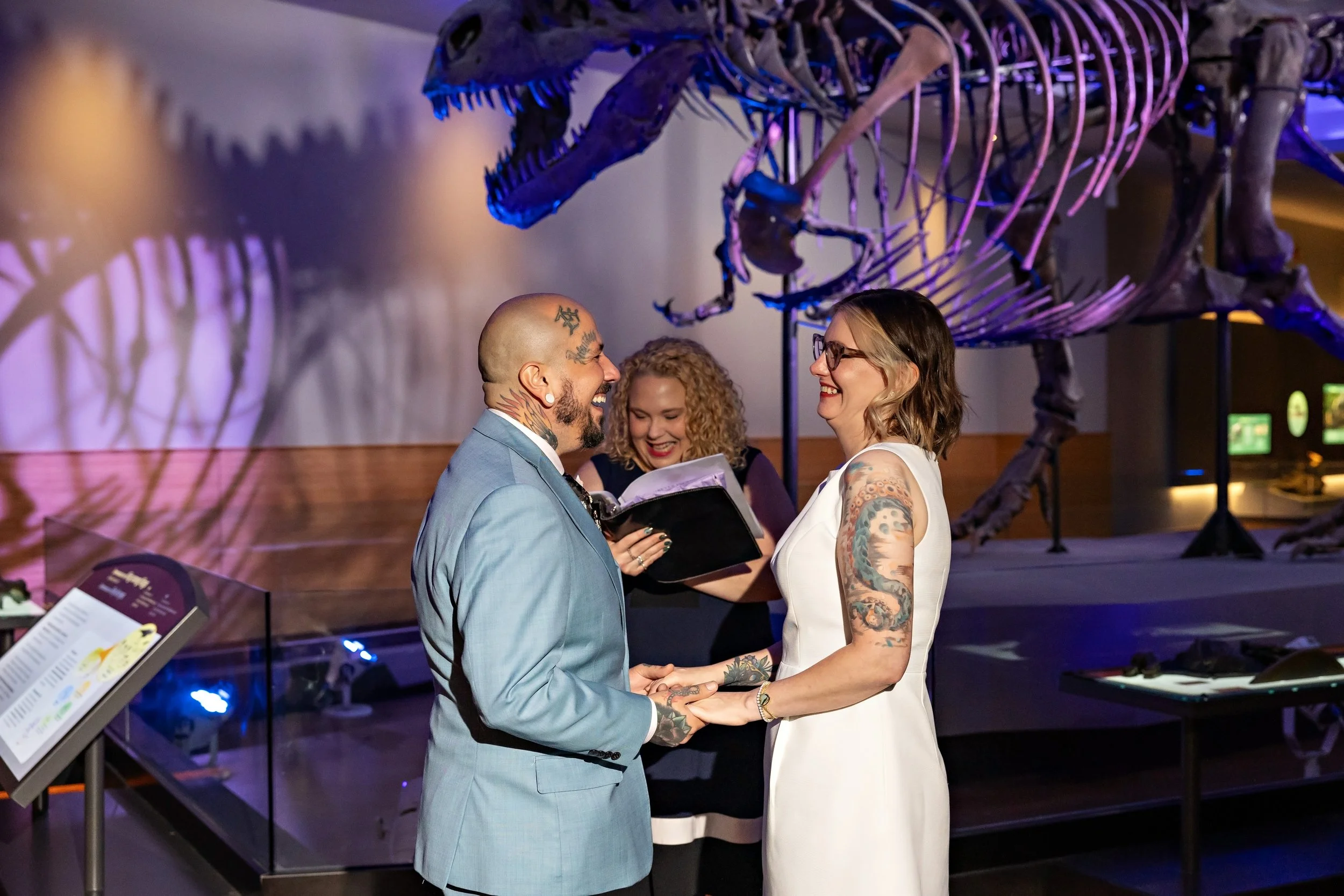 Couple gets married with Forever Incredible Ceremonies and Elope to Chicago at the Field Museum in front of SUE dinosaur skeleton