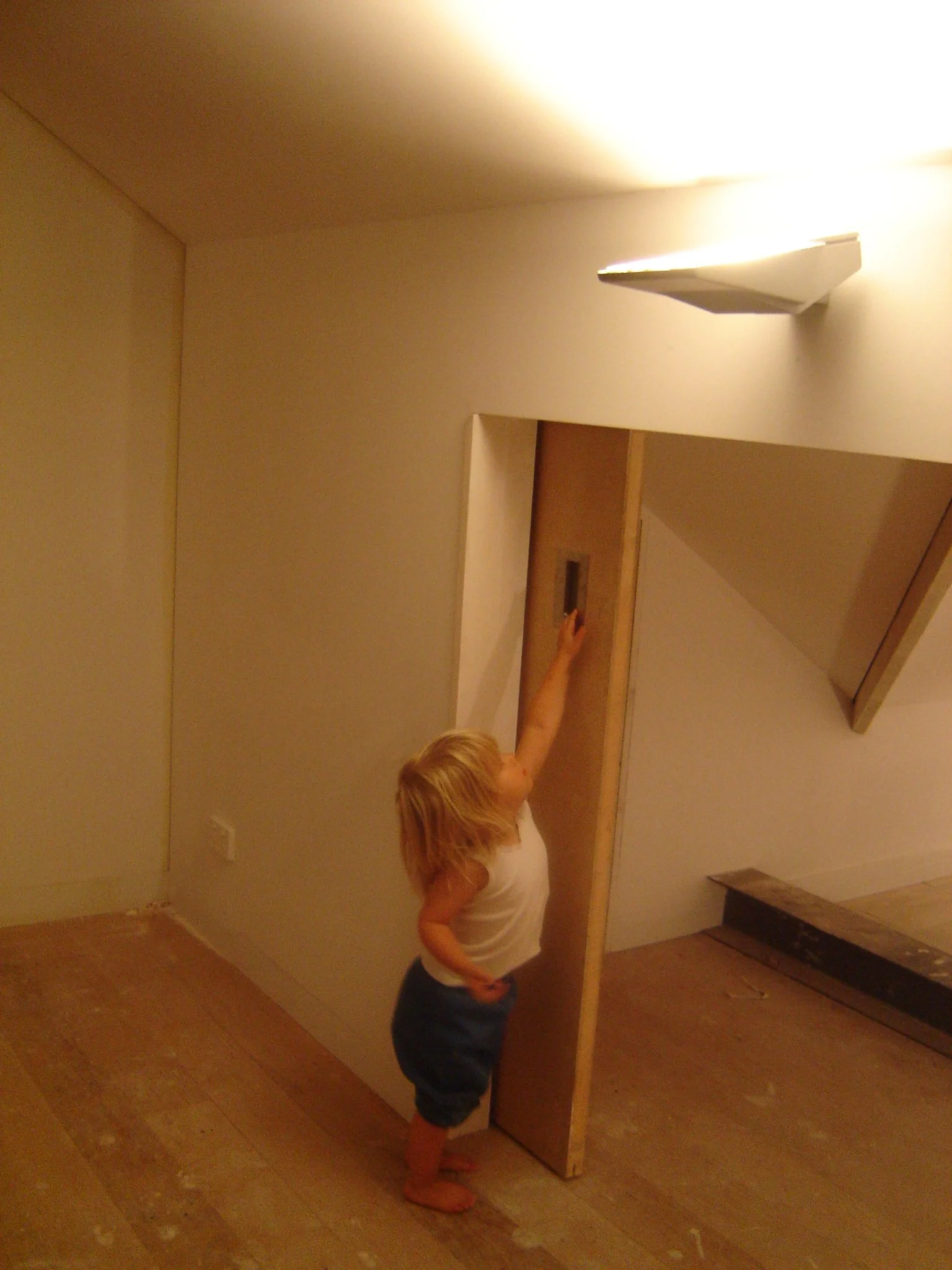   Grandchild tries the sliding door for size  