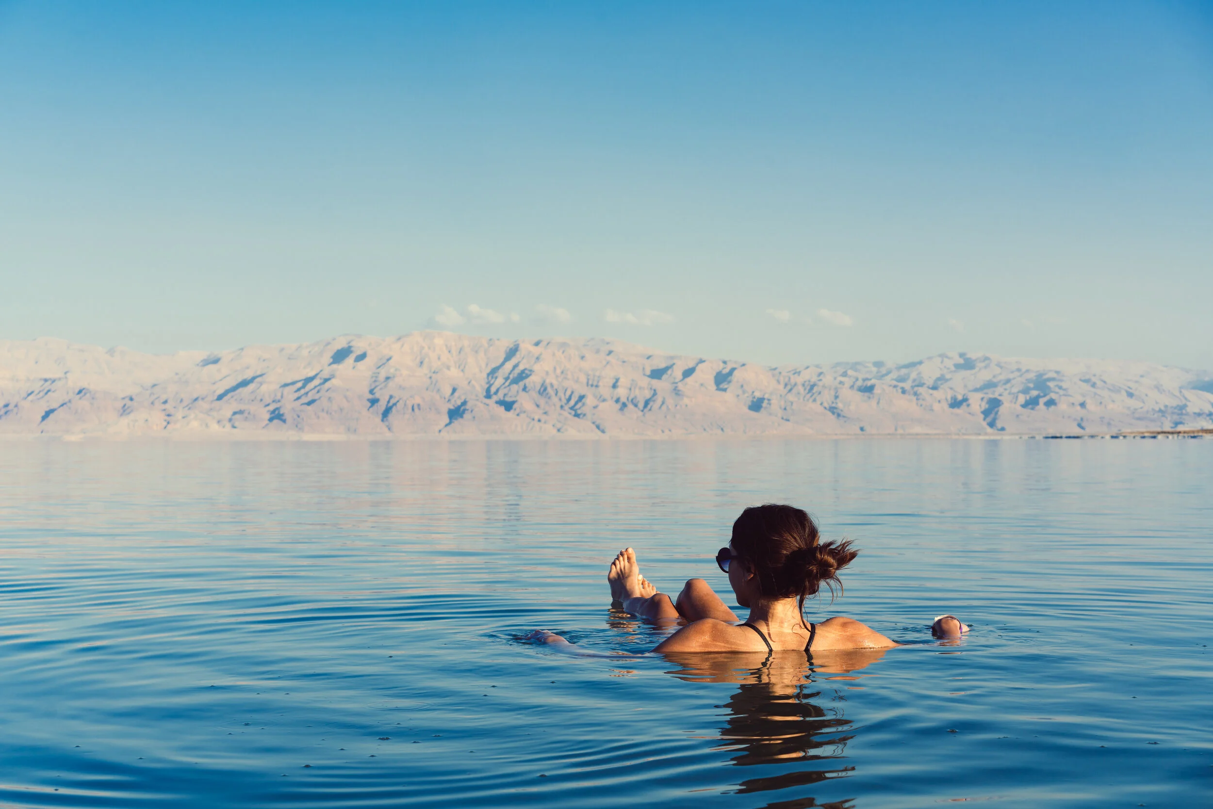 An image of a woman floating in the Dead Sea