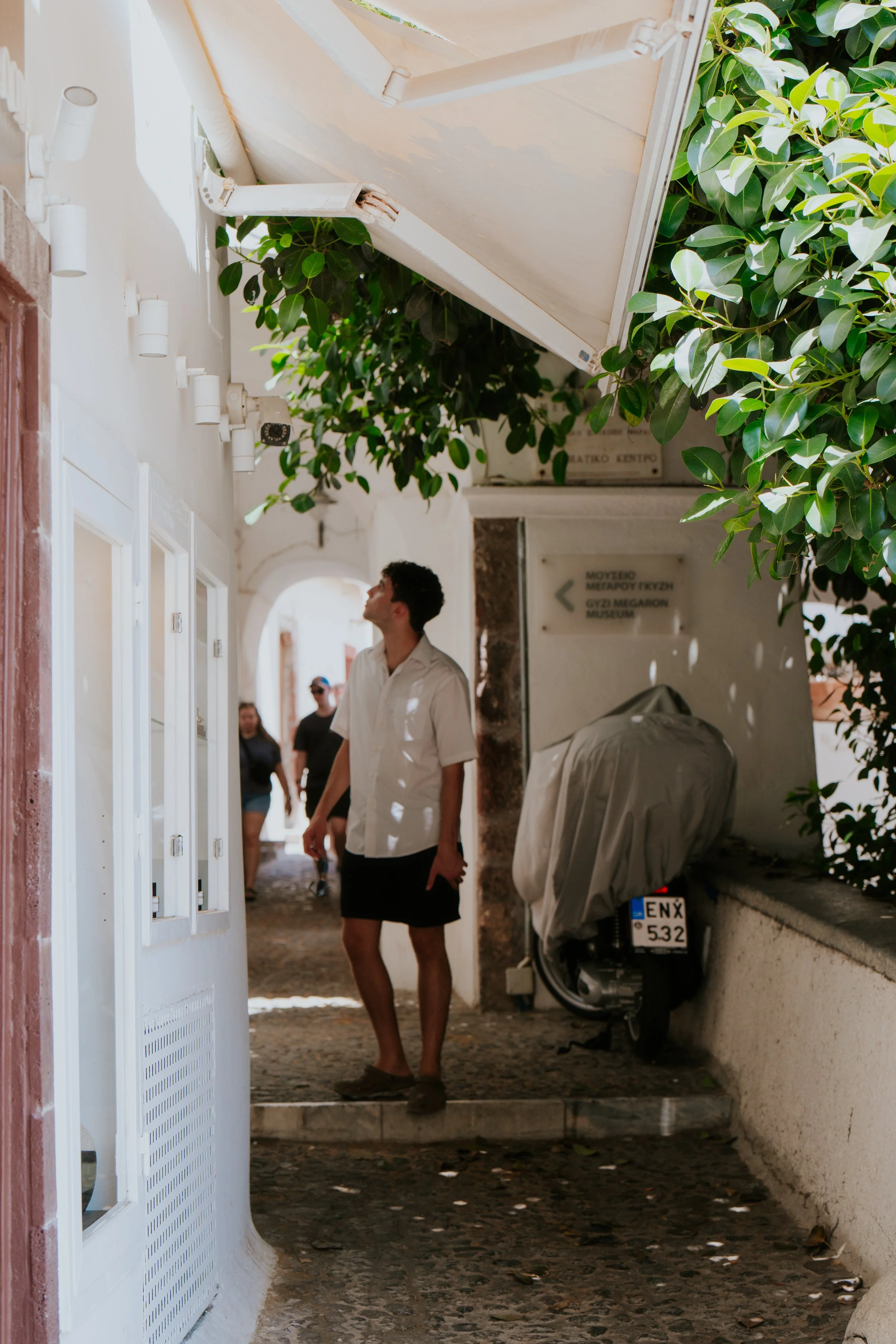Image of man on street in Greece photo by Claire A. Nichols