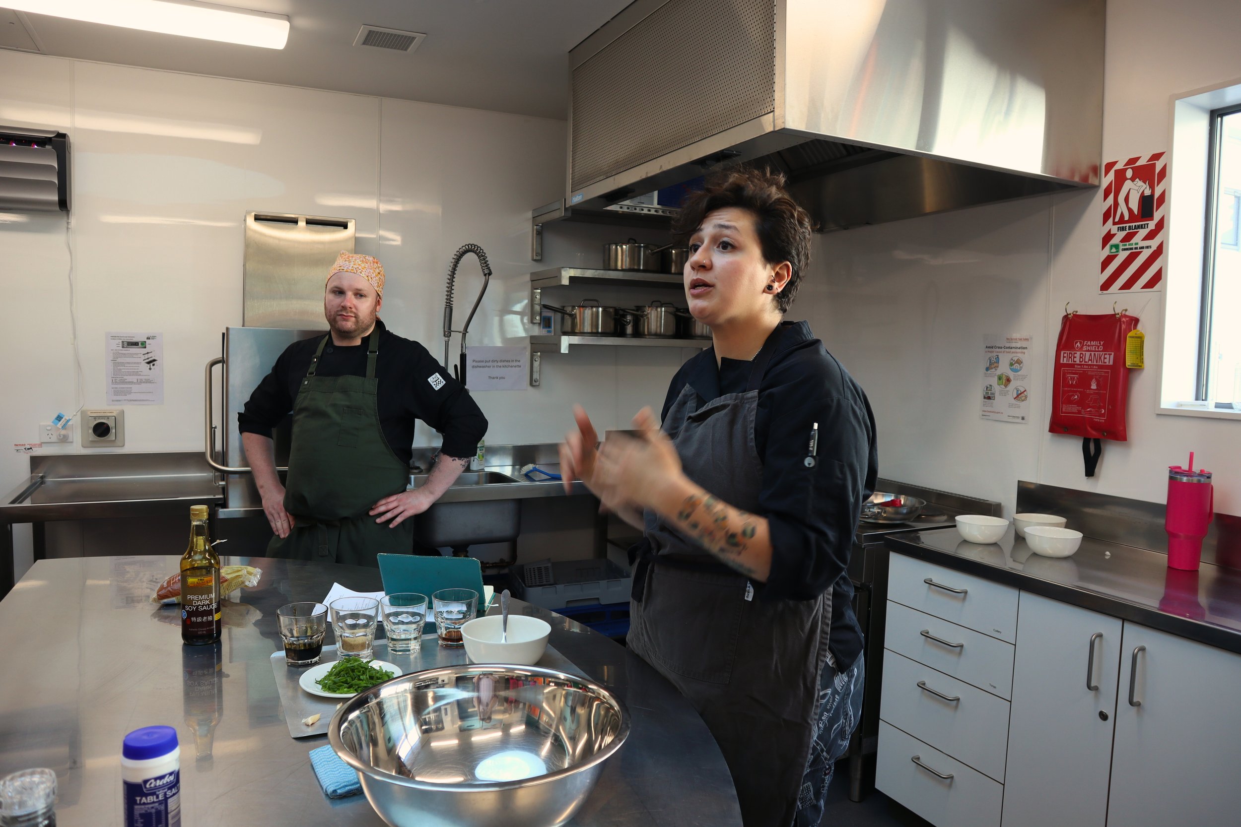Chefs teaching They Ate cooking classes in Naenae Community Centre