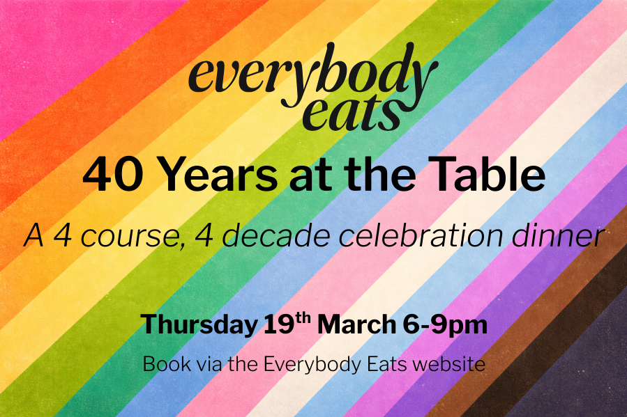 Rainbow with text overlaid - text is the name of the event and date