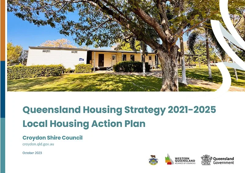 Cover page of Queensland Housing Strategy 2021-2025 and Local Housing Action Plan with a photo of a white house with a porch, surrounded by green grass and trees, under a blue sky.