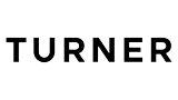 The image shows the word 'TURNER' written in large, white capital letters on a black background.