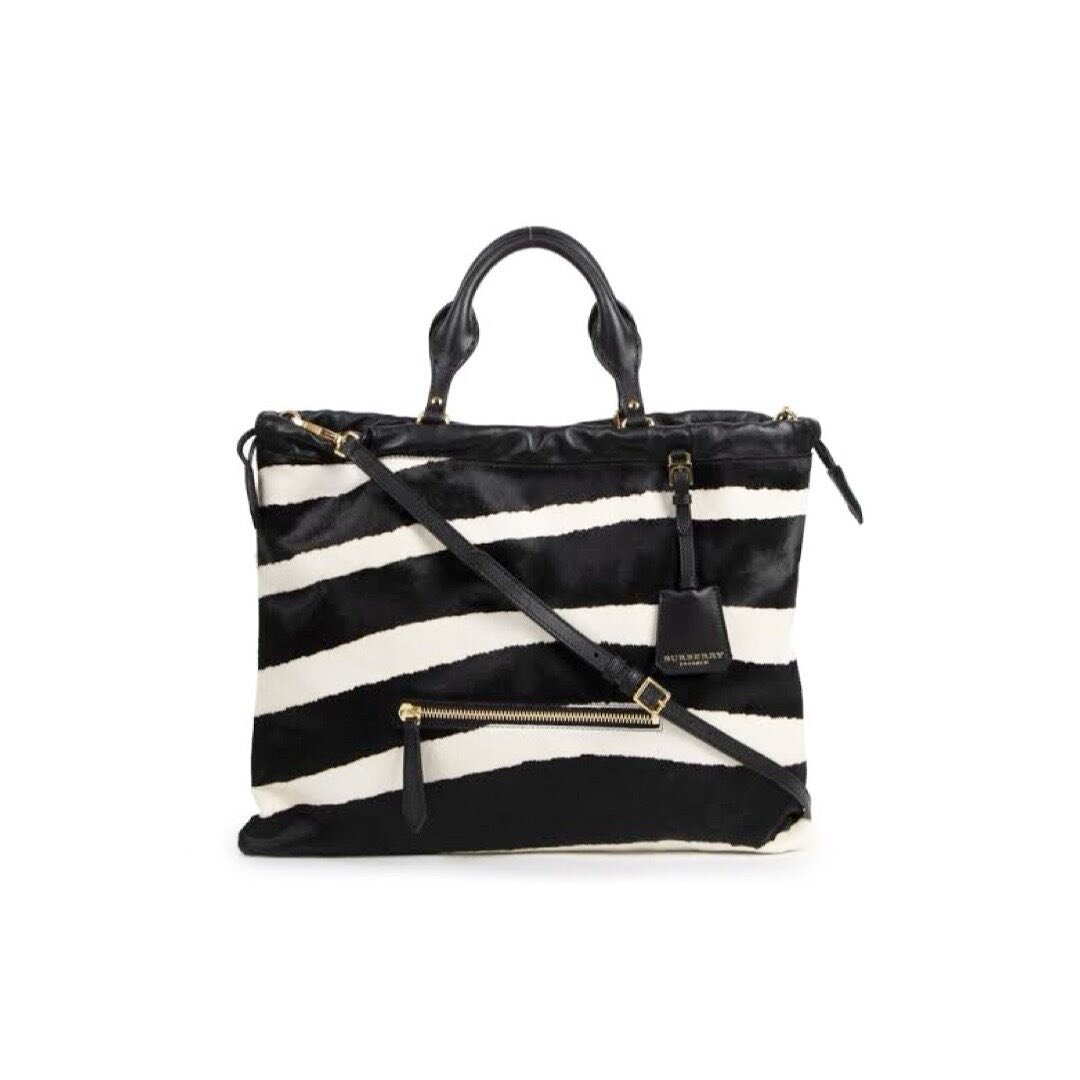 Explore our amazing new arrivals now available in store. ✨Open 10am-5pm today 

Just in @burberry Prorsum Zebra Crush Pony Hair Tote with Strap | $995🖤

In zebra print calf hair with soft leather trimmed zebra bag is soft to the touch.
Featuring bla