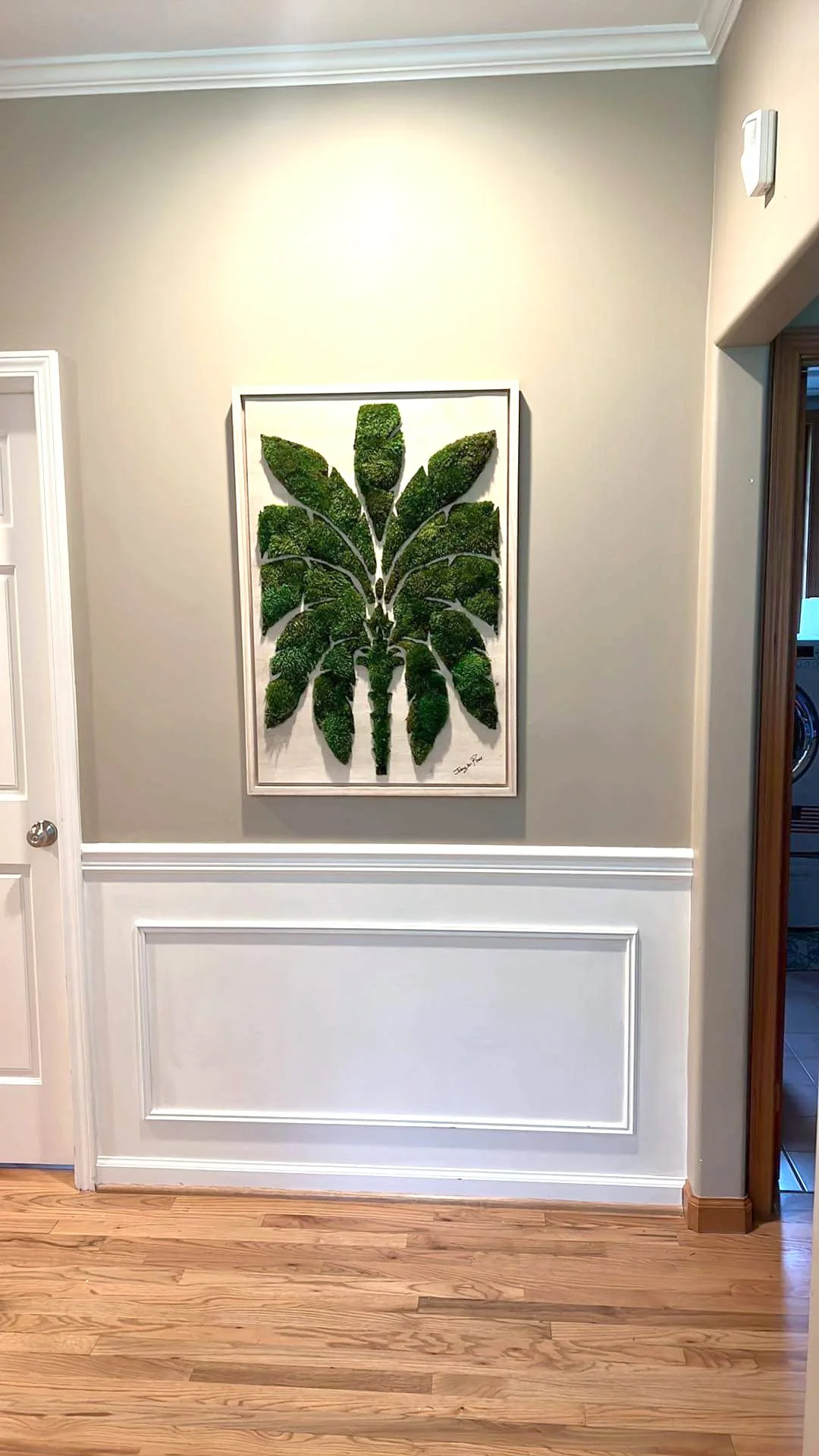 Custom moss wall art in a private Woodinville residence