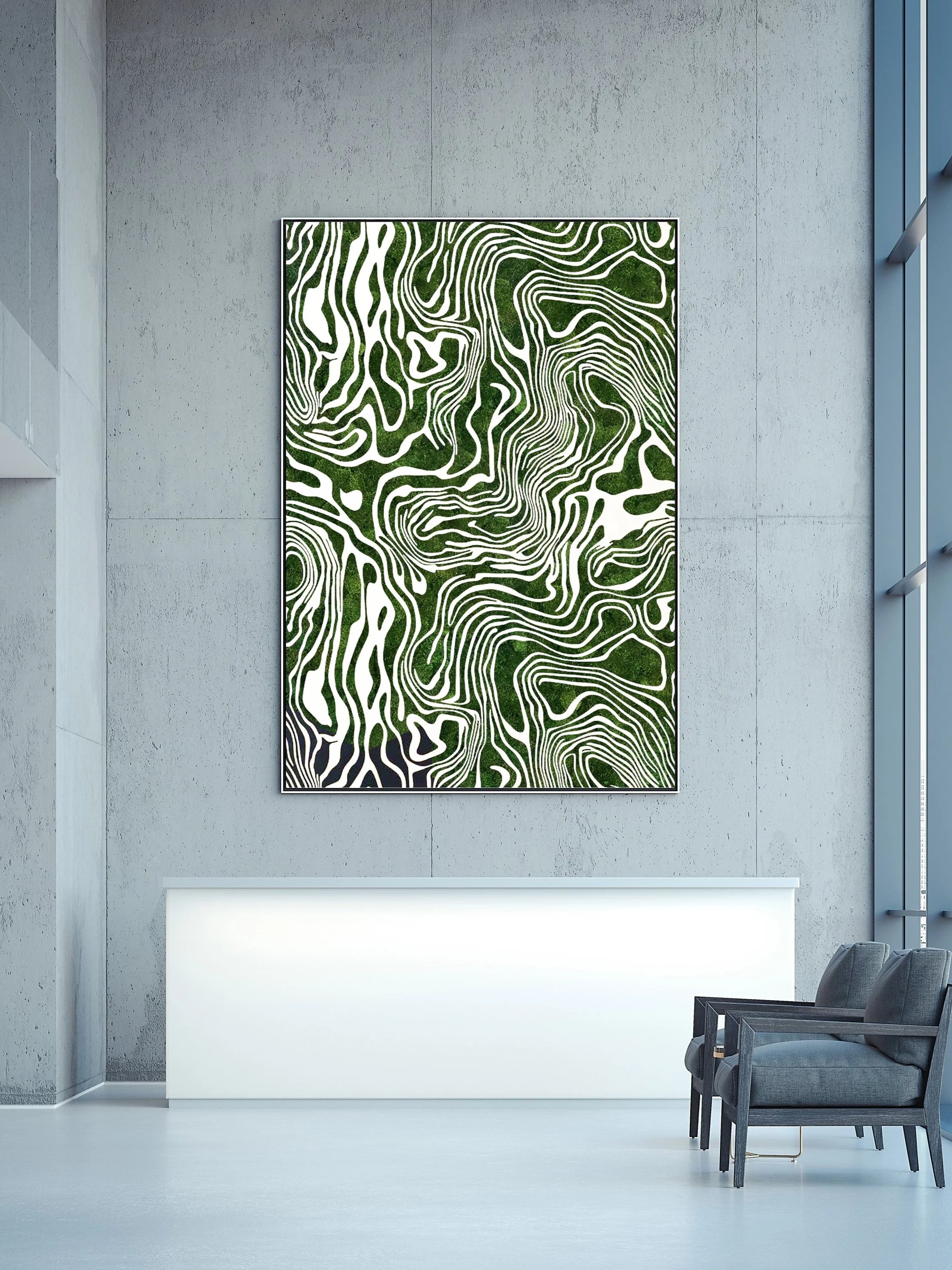 Modern interior with a large abstract preserved moss artwork on a gray concrete wall, a white reception desk, and a gray armchair with metal frame on a light floor.