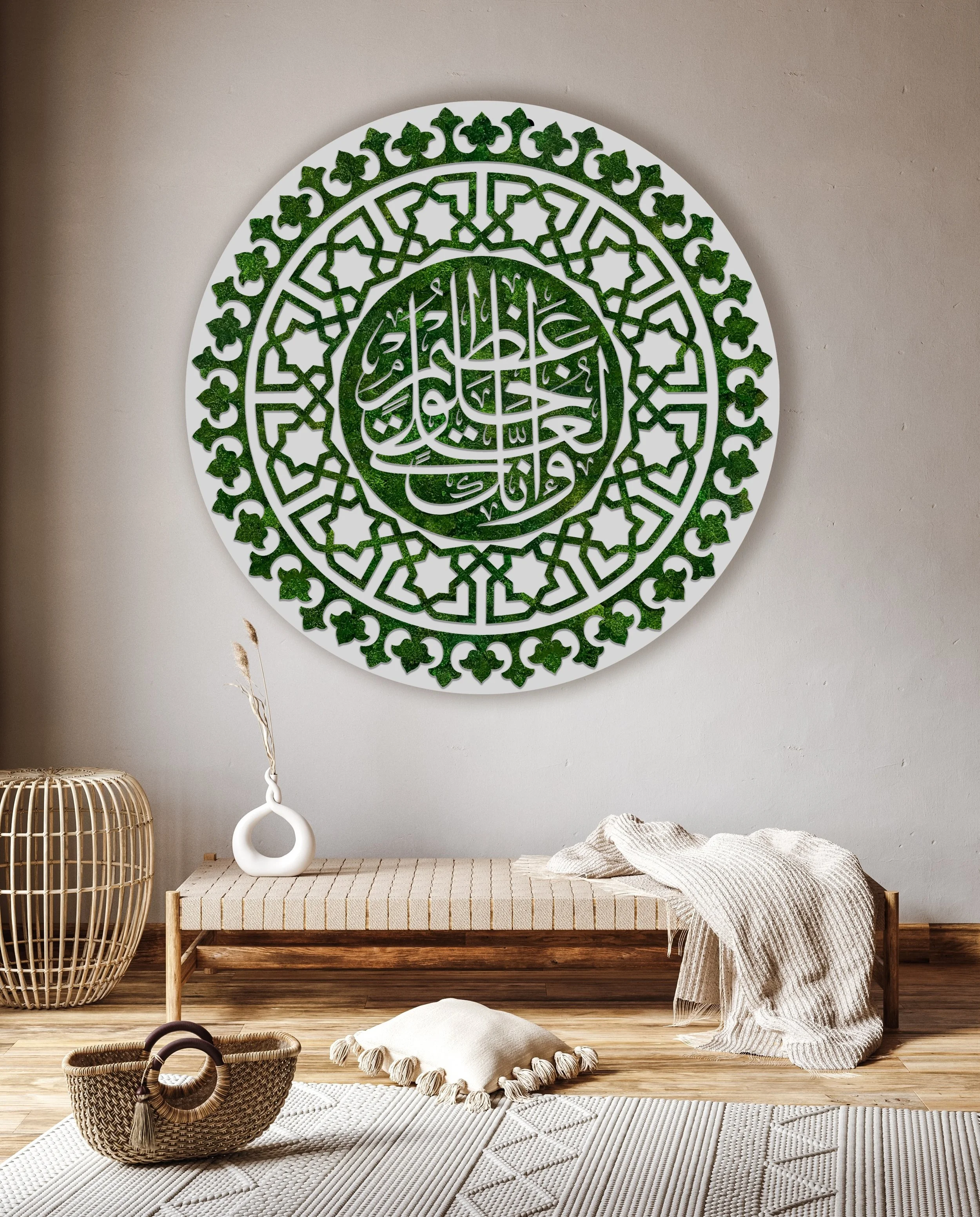 Interior of a minimalist room with a neutral color palette. The wall has a large round preserved moss art piece with green Arabic calligraphy and geometric patterns. The floor features a beige patterned rug.