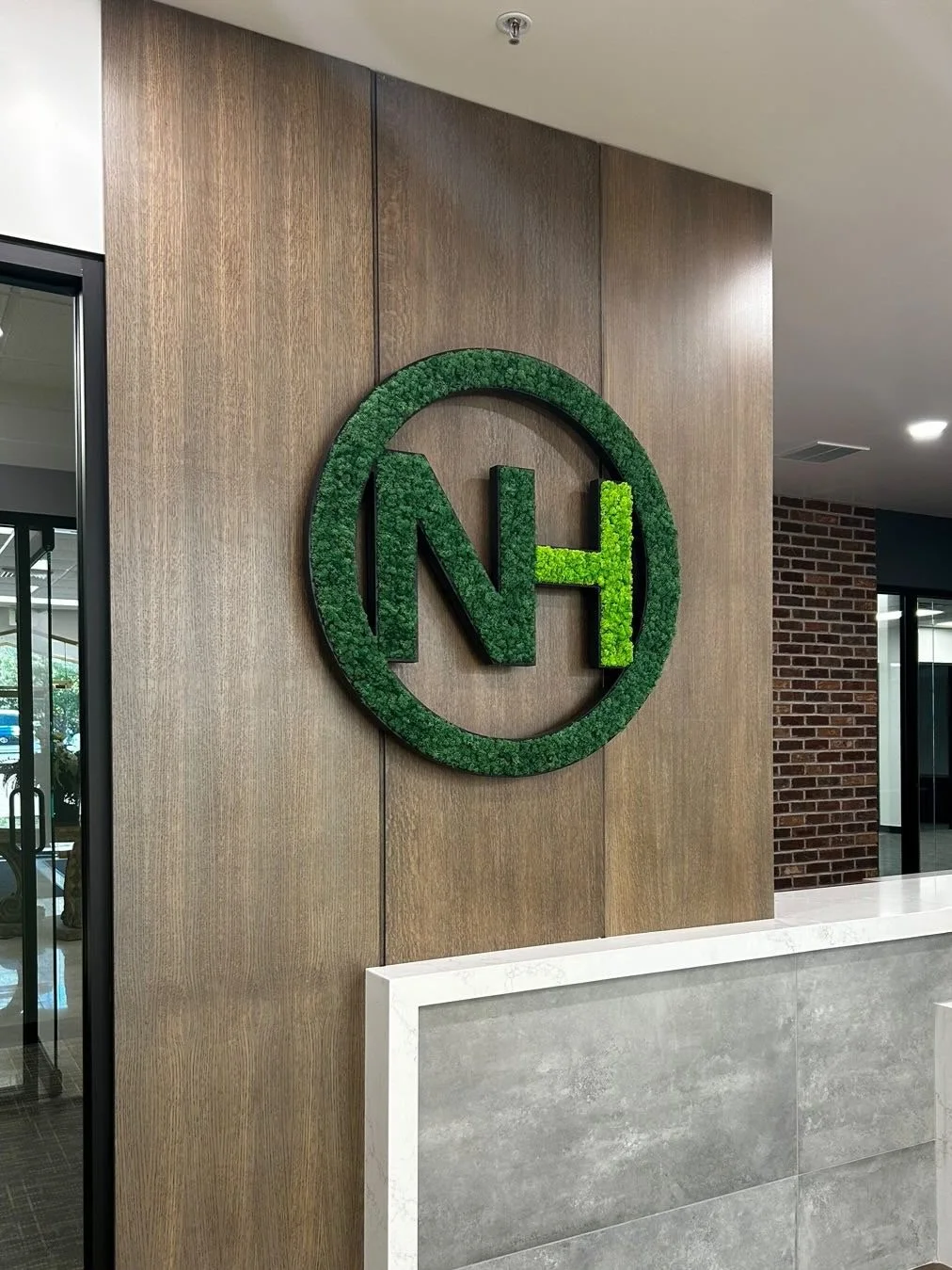 Preserved moss art installation in a corporate office space