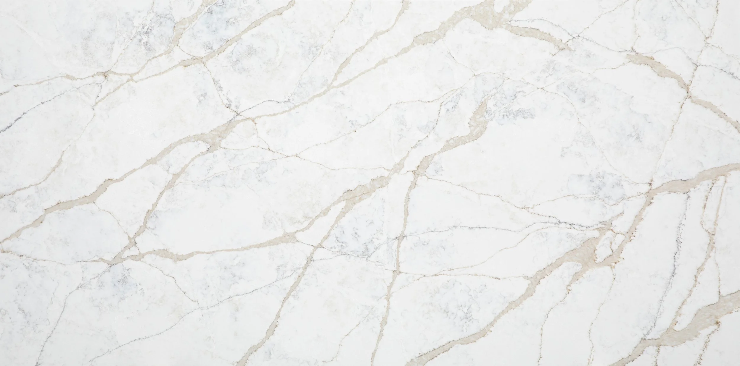 Granada Beige quartz countertops in Austin TX kitchen by Austin Cabinets Direct with warm neutral tones and modern shaker cabinets