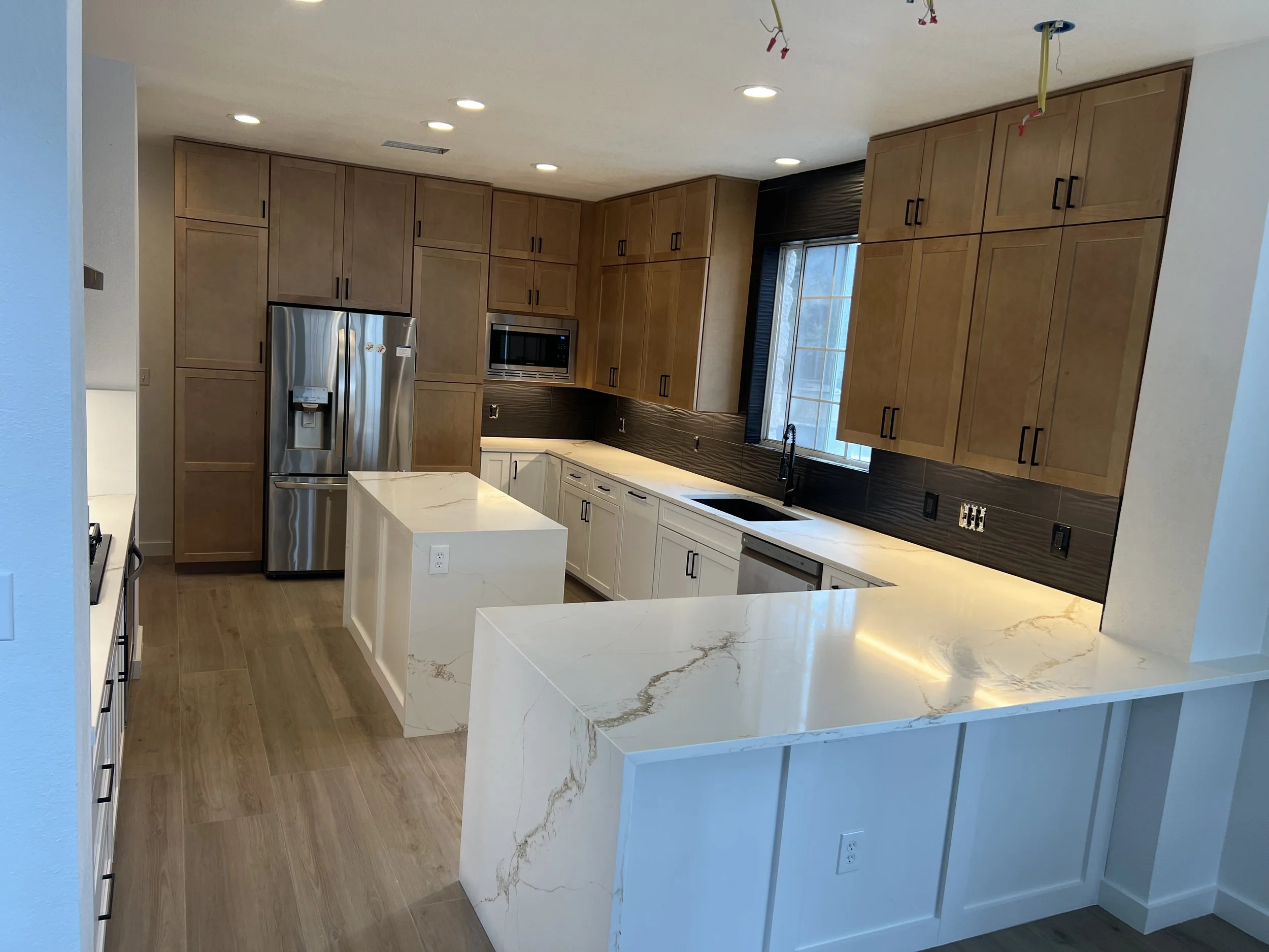 Shaker Maple Rye & Painted Vanilla with quartz countertops 