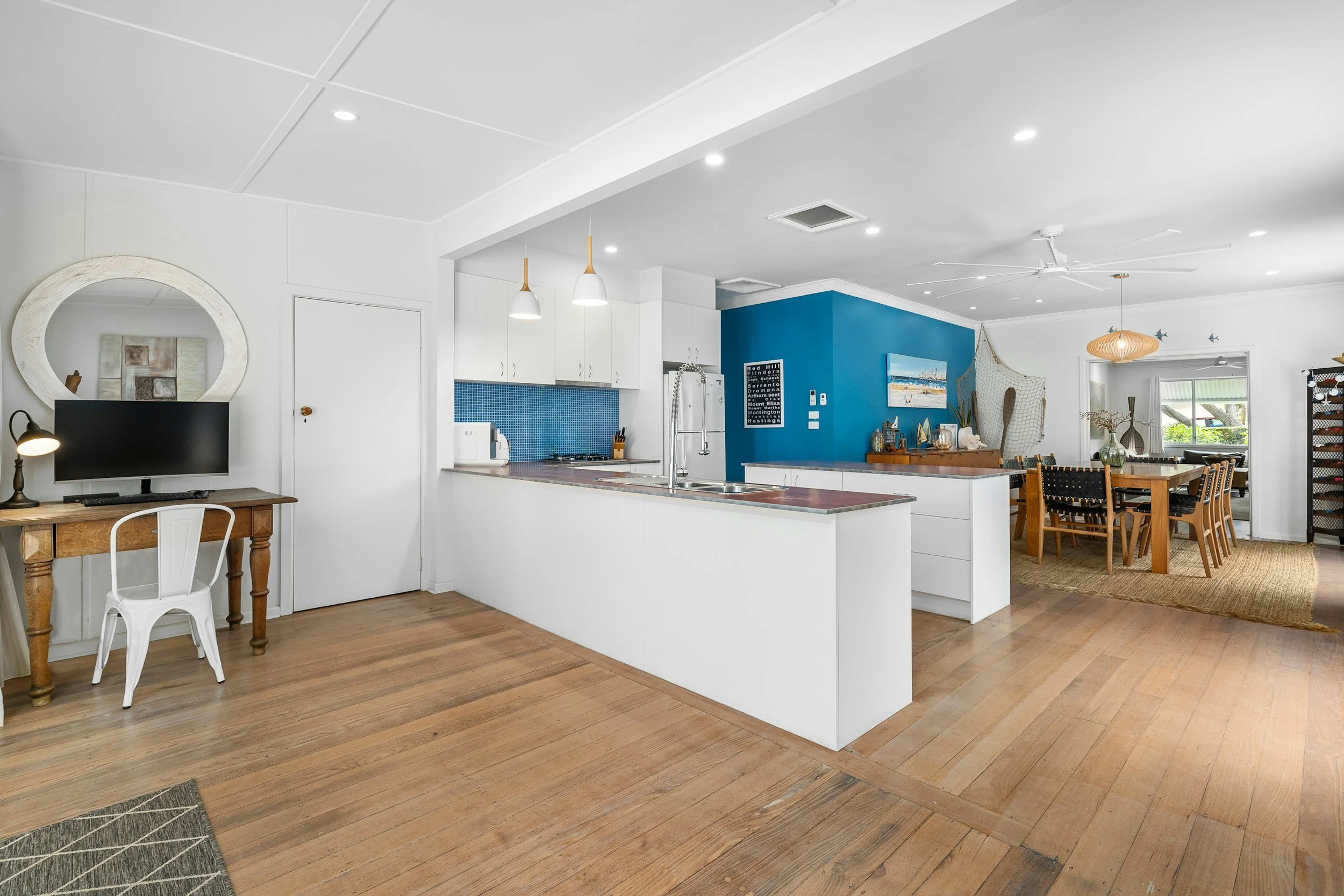 Character home interior renovation in Victoria BC with restored trim and new flooring