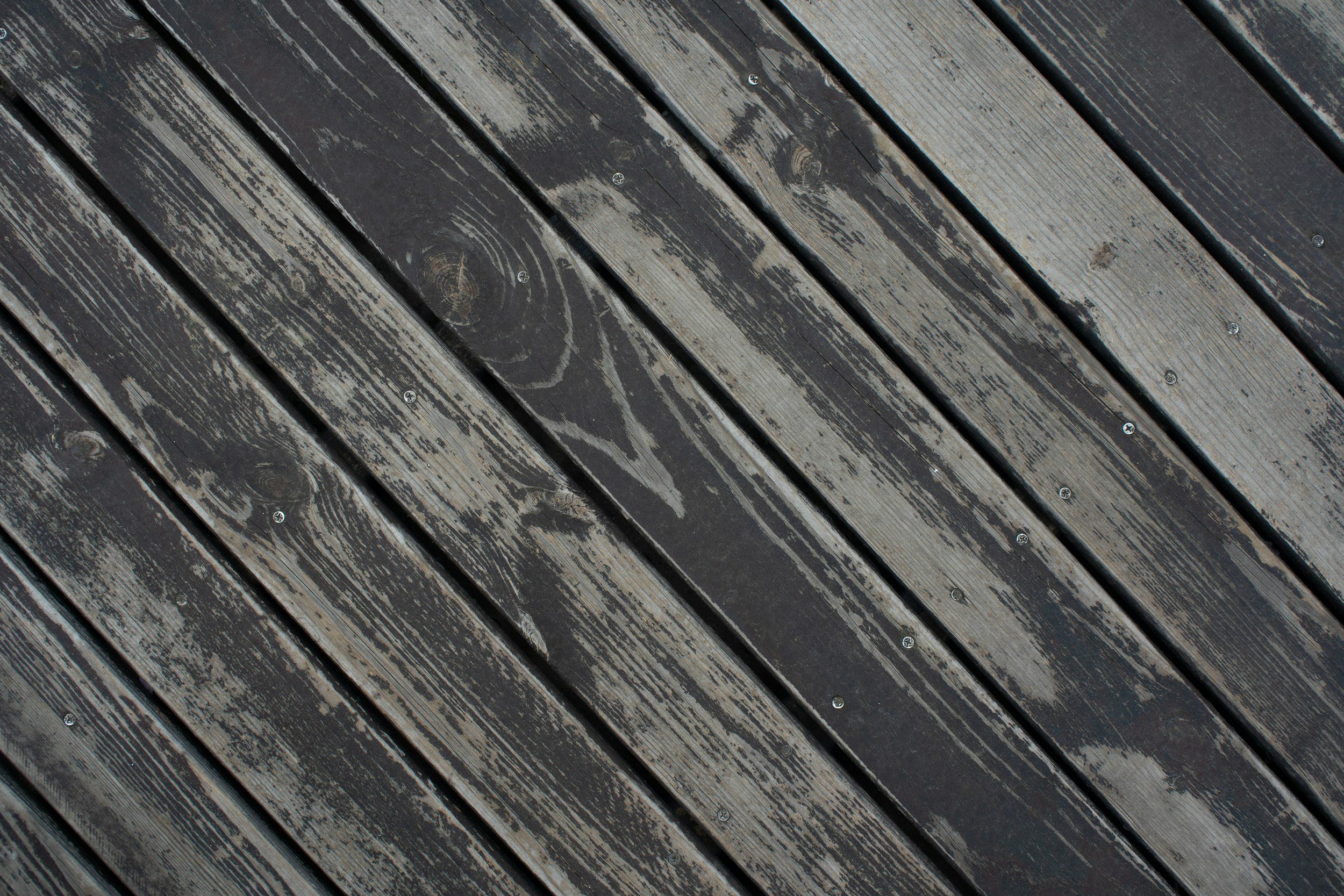 Close-up of weathered wooden deck boards.