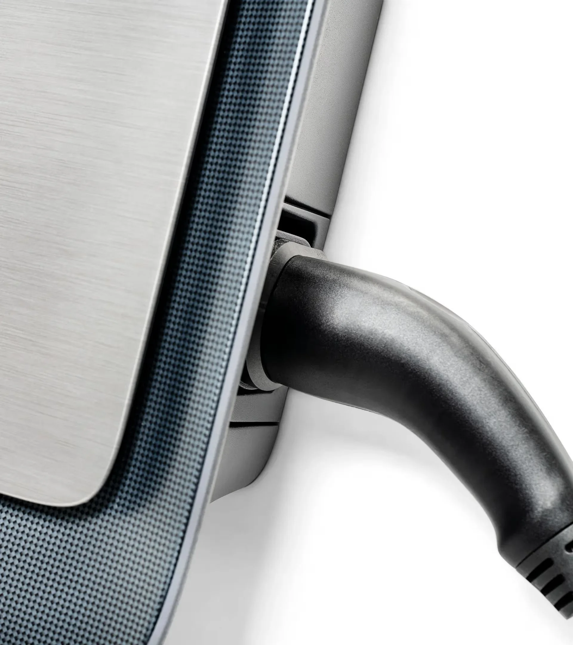 Close-up of an electric vehicle charging port and cable.