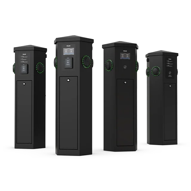 Four black electric vehicle charging stations aligned in a row against a white background, each with a digital display and green illuminated circular control.}