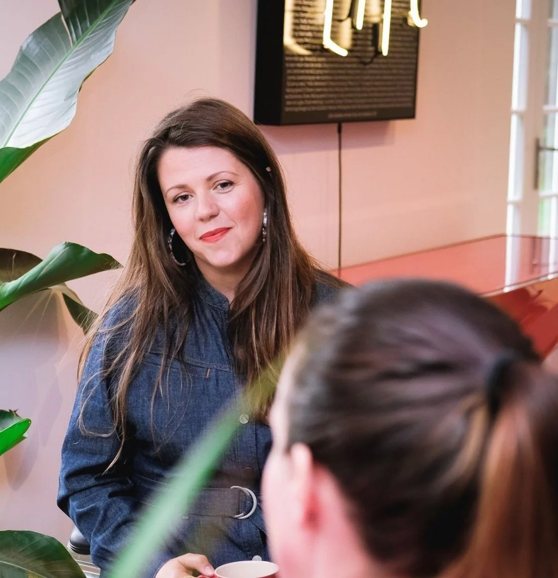 Sara Maxwell coaching a couple about finances