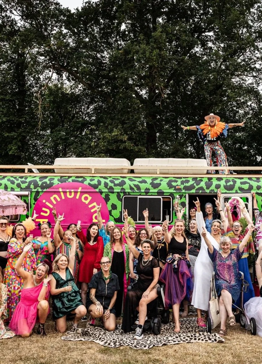 Self love bus with colourful participants including Sara Jane Maxwell