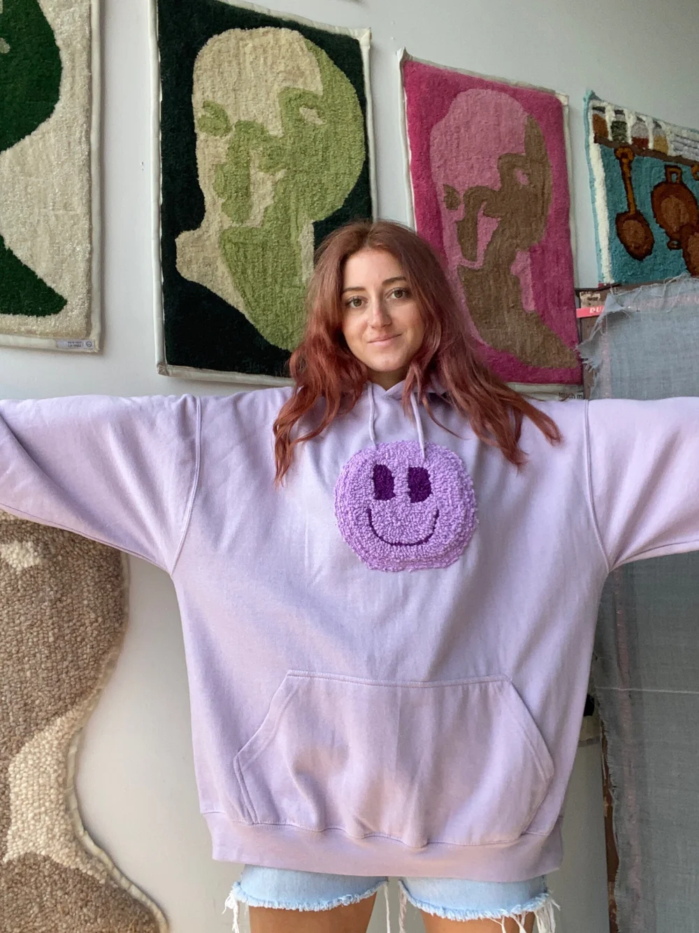 mauve smiley face sweatshirt