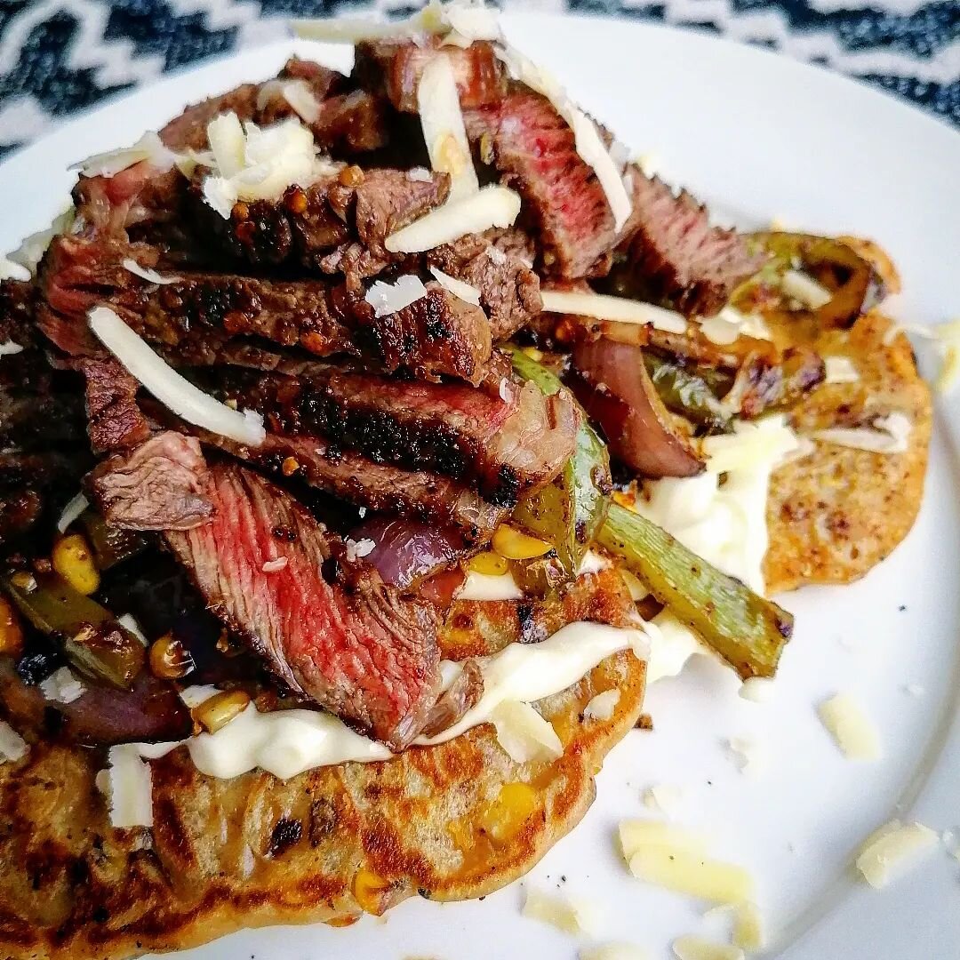 Bbq'd Corn Frittas, Grilled Peppers and Onions, topped with Sliced Ribeye.

#justhavingfun