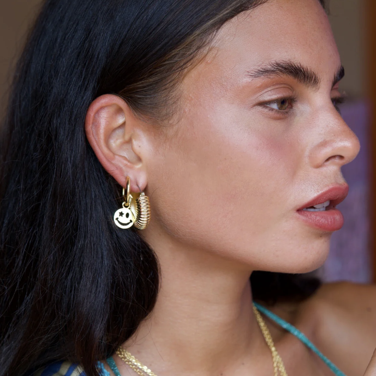 Celeste-starre-wink-if-you-are-happy-model-earrings.png