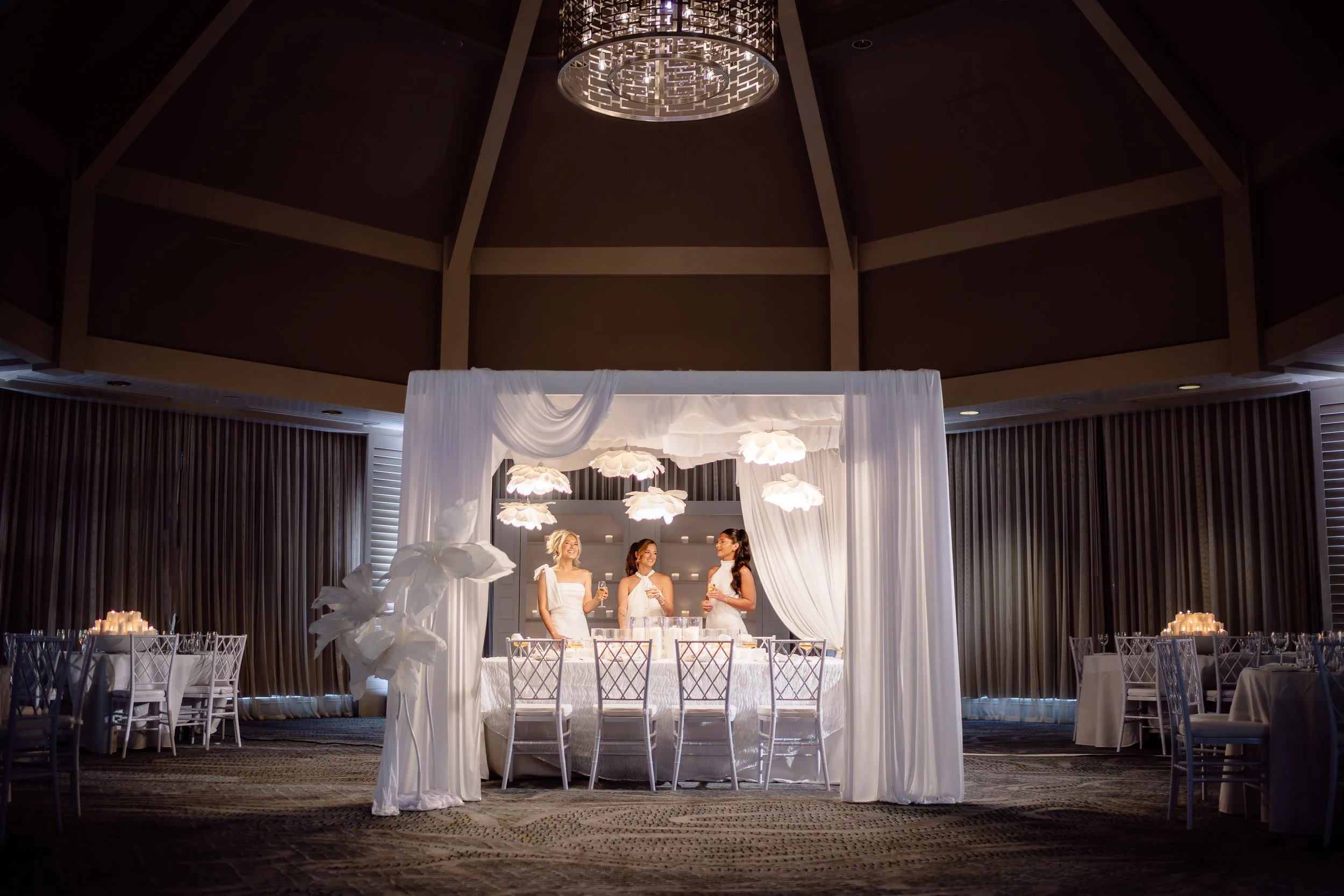 10x10 White Trellis with Custom Draping, White Paper Flower Chandeliers, White Paper Flower Stand, White Diamondback Chairs, Kings Table (Photography by Matt Steeves Photography, Design by CocoLuna Events)