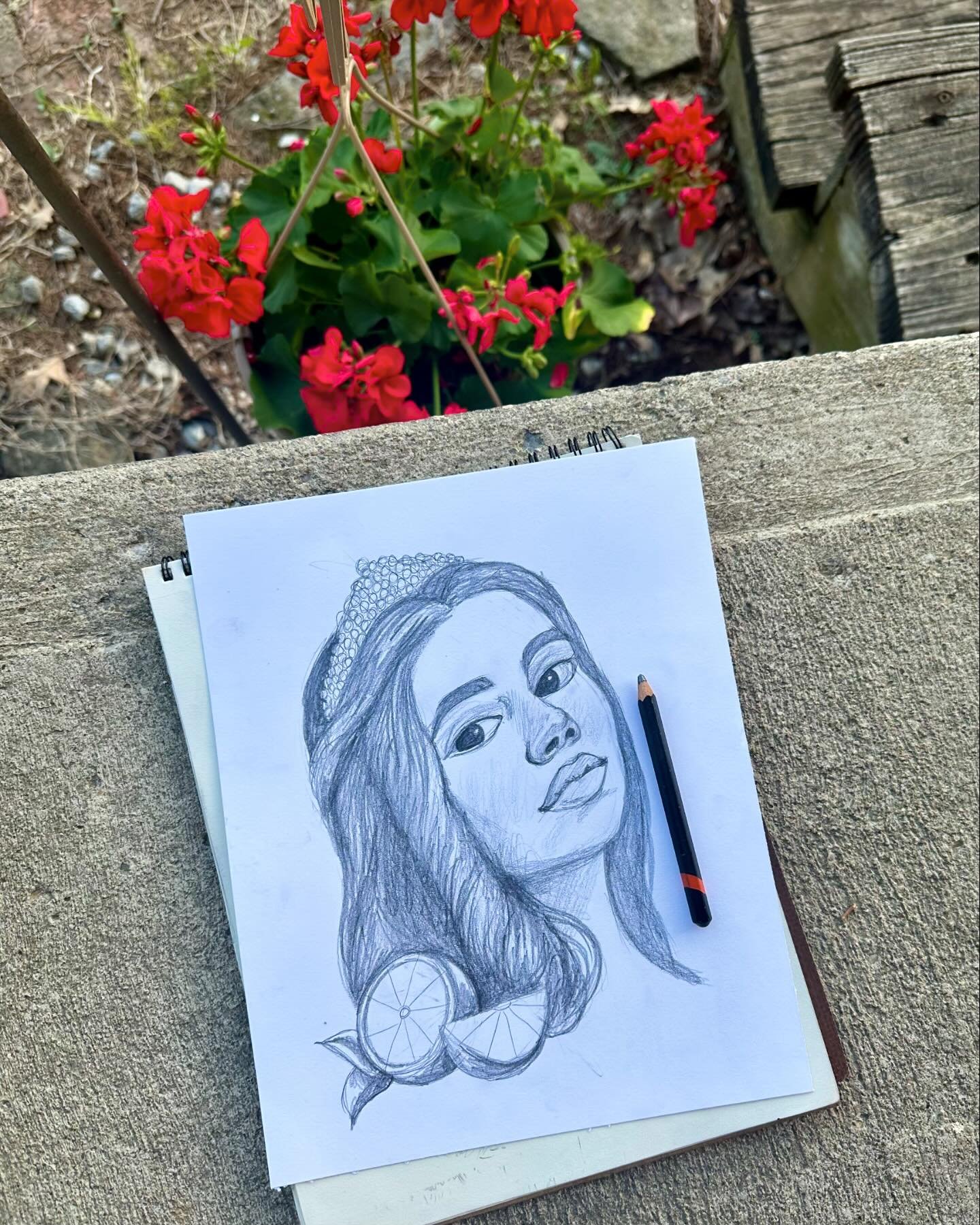 It&rsquo;s a beautiful day so I&rsquo;m drawing outside this evening with Nova and my new flowers 🌺 #ohioartist #portraitart #fruitofthespirit #christianart #christianartist