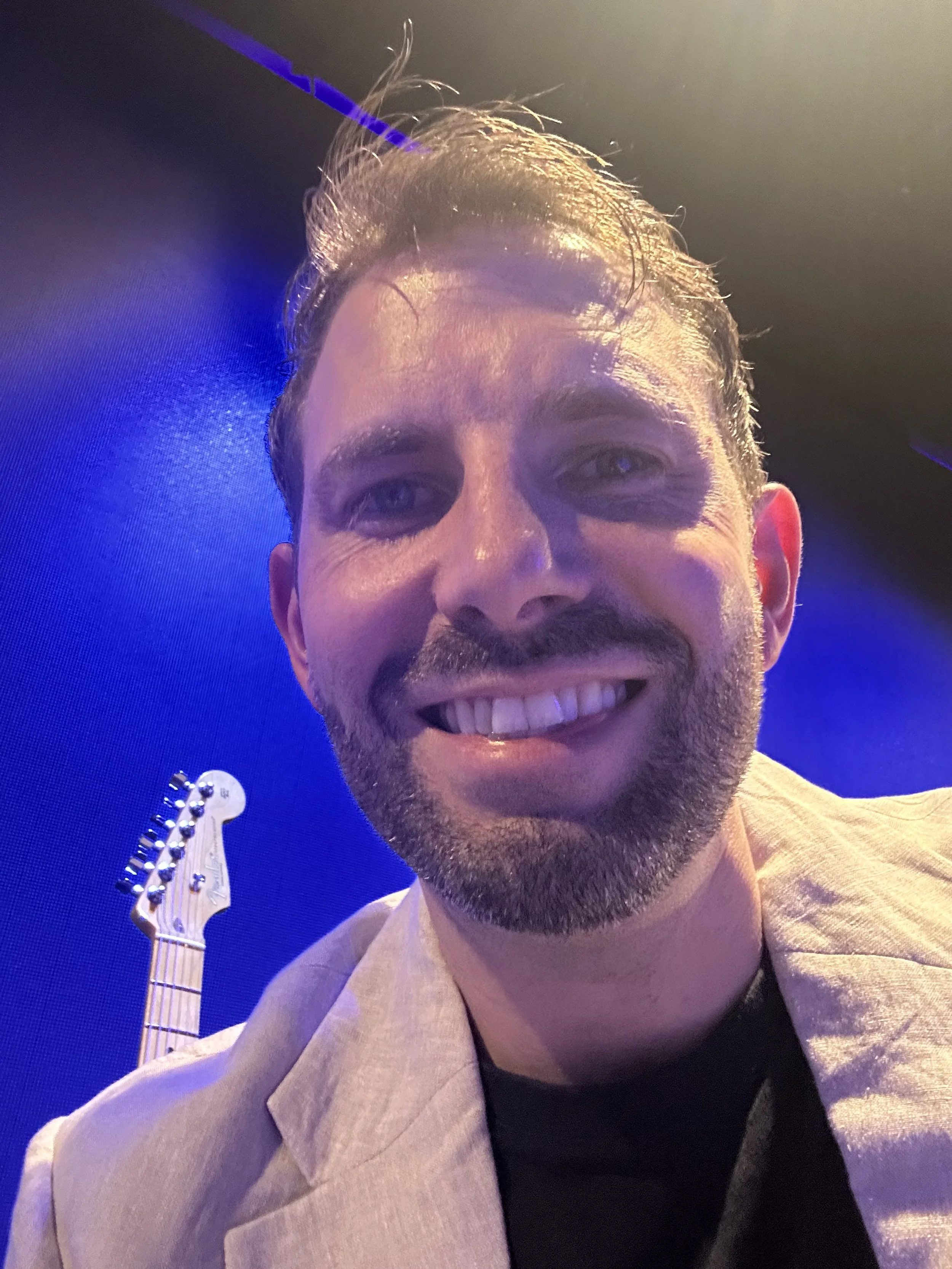 Ian Michael Frost performing his Eric Clapton tribute show with his fender Stratocaster guitar