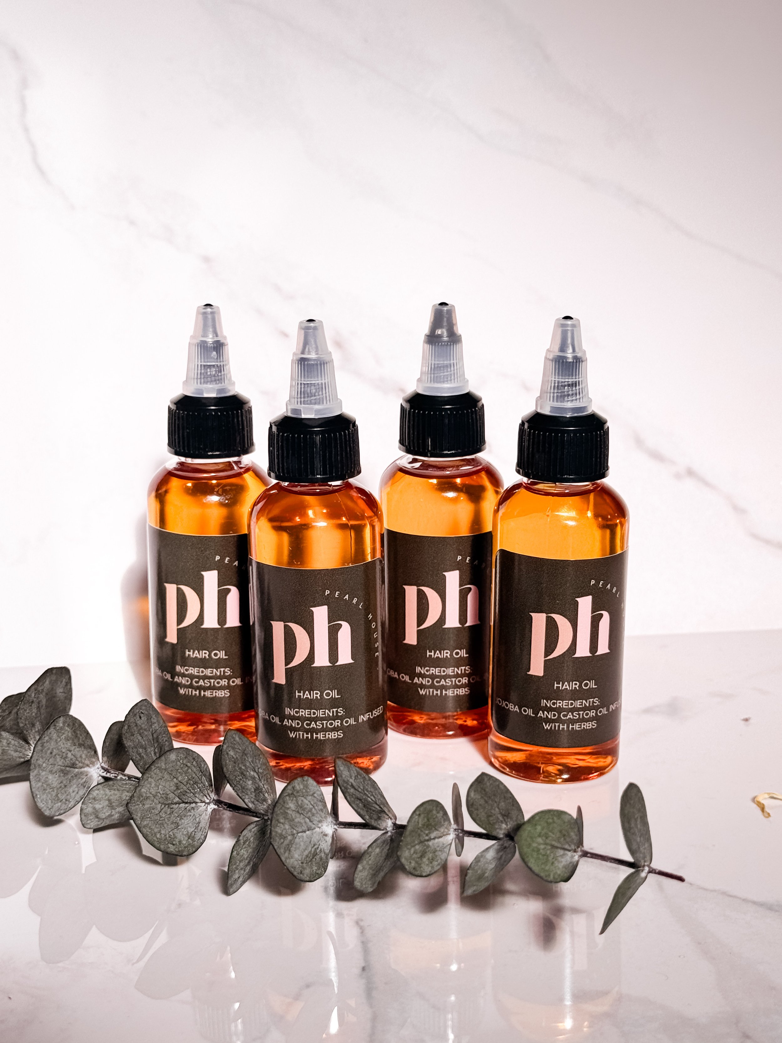 herbal and strengthen hair oil in 20z bottle with application tip bottle