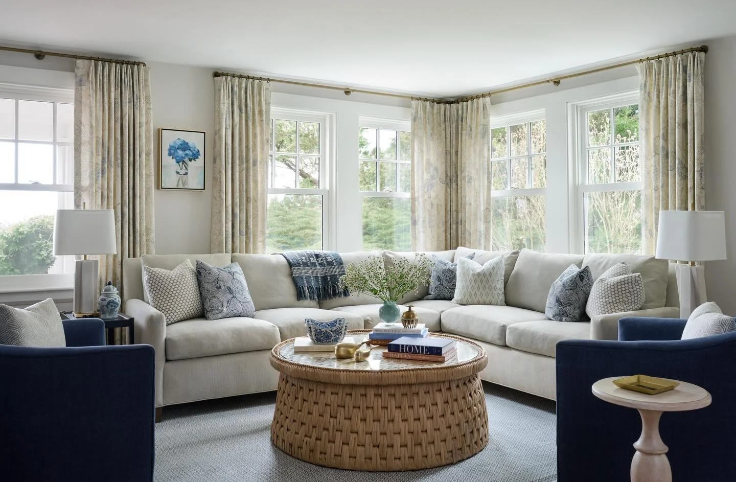 After and Before Cape Cod style. 🐋 Three key updates around the windows completely transformed this space:

▫️Painted the dark window molding and trim white: This immediately makes the room feel brighter and lighter.
▫️Removed the dated window corni