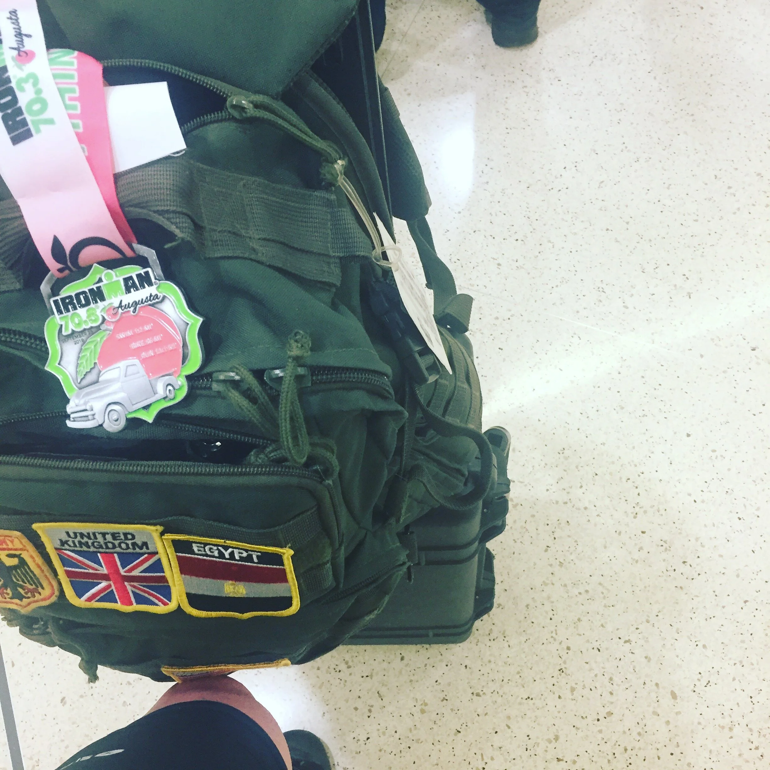 Waiting in Atlanta to board my flight, Ironman leg is done, now the real adventure begins.